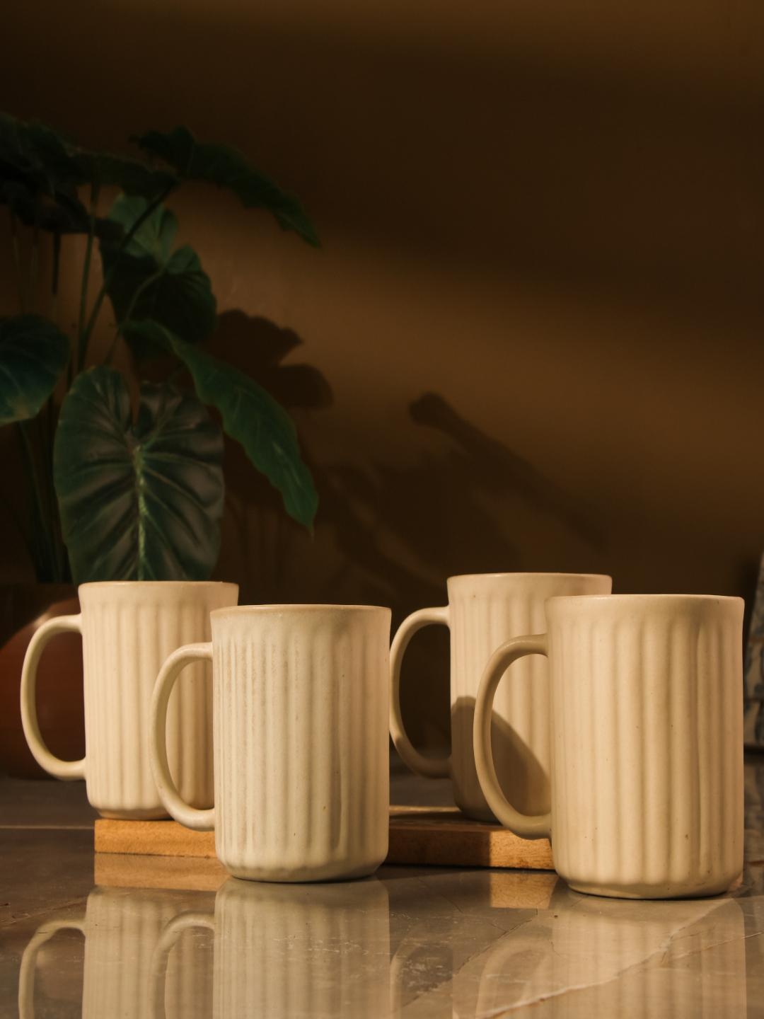 

The Decor Mart White 4 Pieces Textured Ceramic Matte Mugs