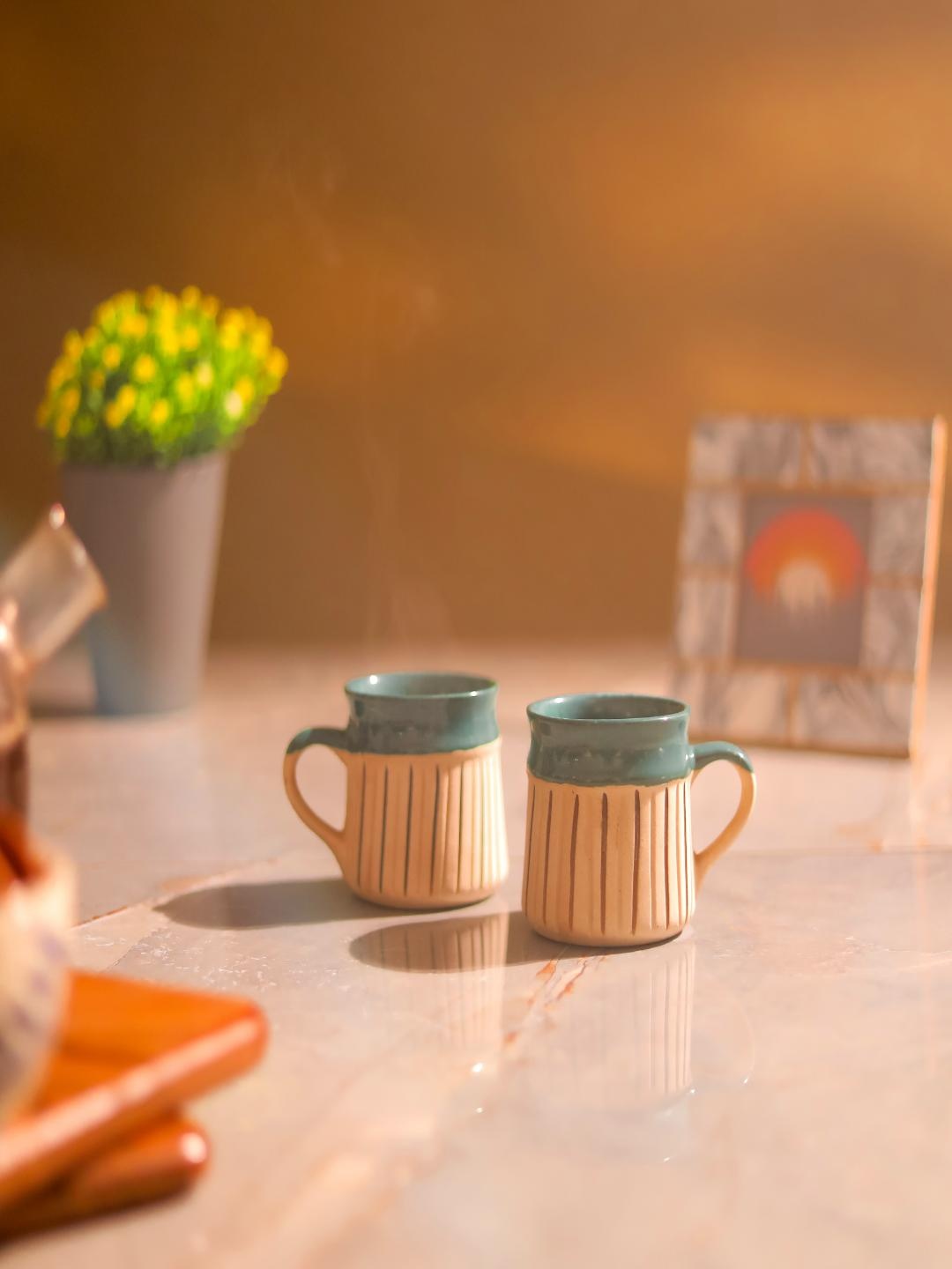 

The Decor Mart Cream & Green 2 Pieces Printed Ceramic Matte Mugs