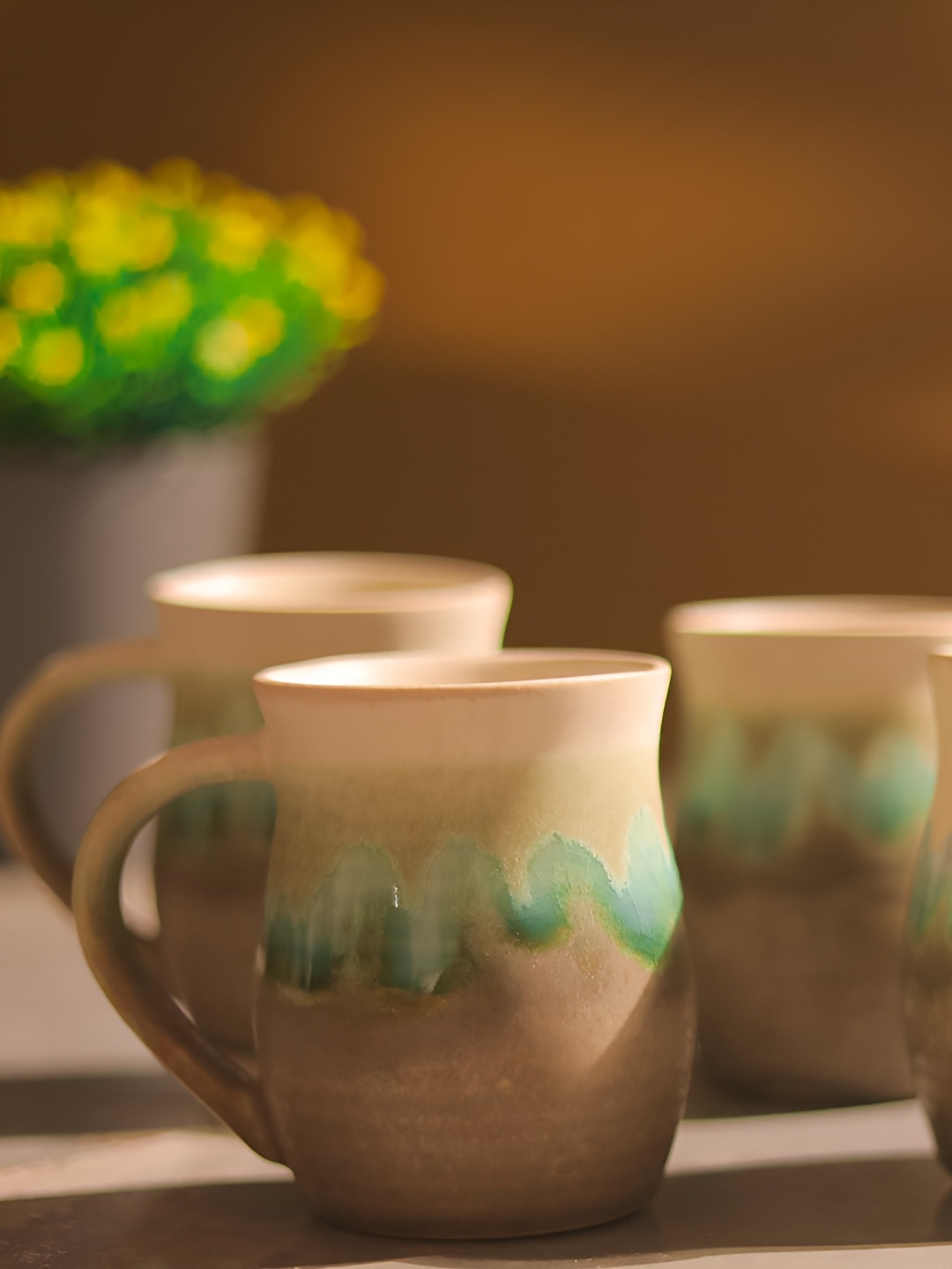 

The Decor Mart Brown & Green 4 Printed Printed Ceramic Matte Mugs 300 ml Each