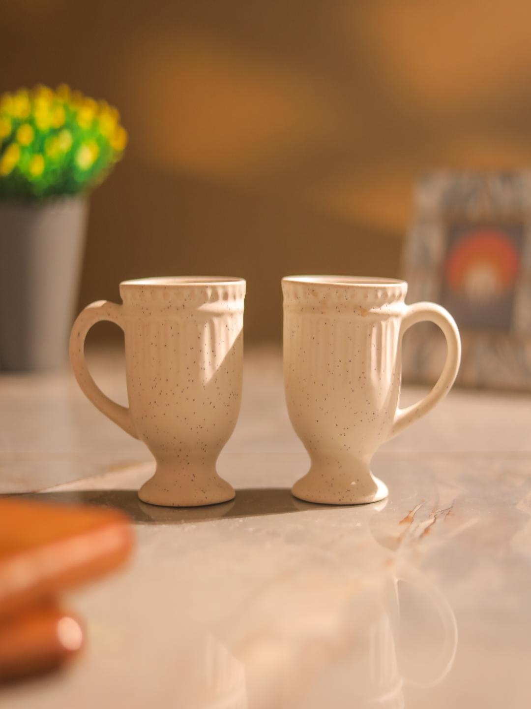 

The Decor Mart White 4 Pieces Textured Ceramic Glossy Mugs 300 ml Each