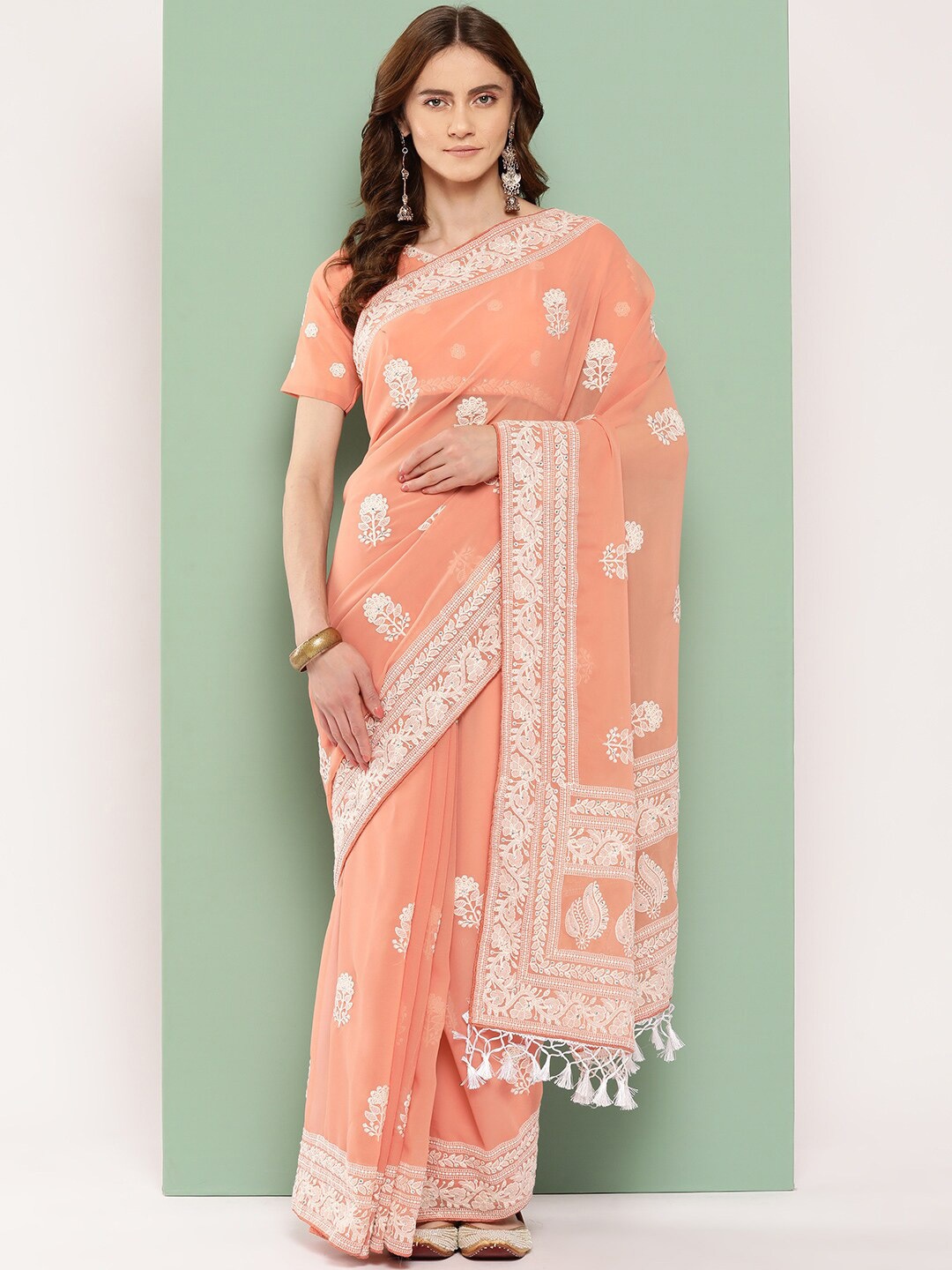 

Shaily Peach Floral Chikankari Embroidered Pure Georgette Saree