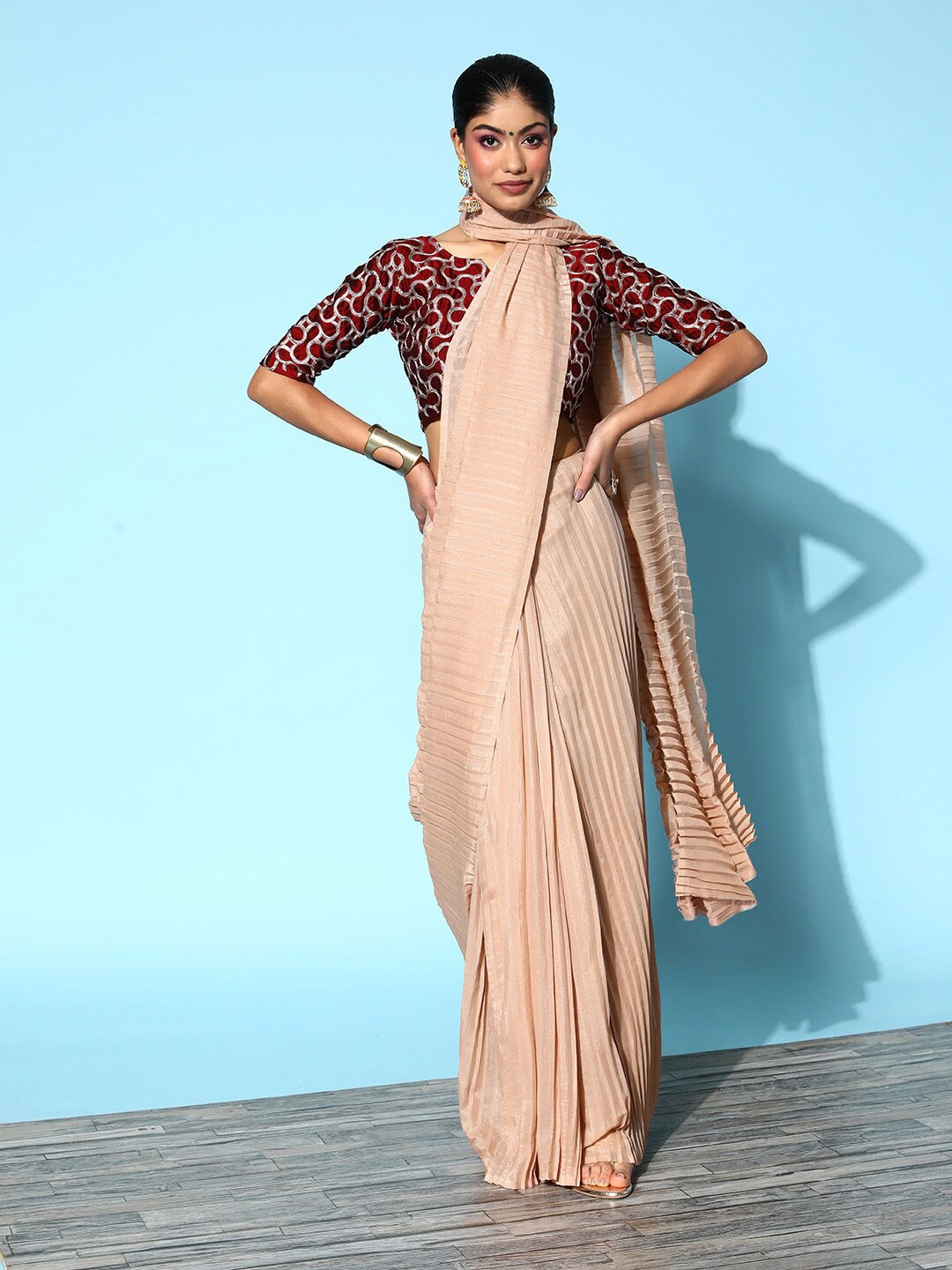 

Mitera Brown Striped Saree