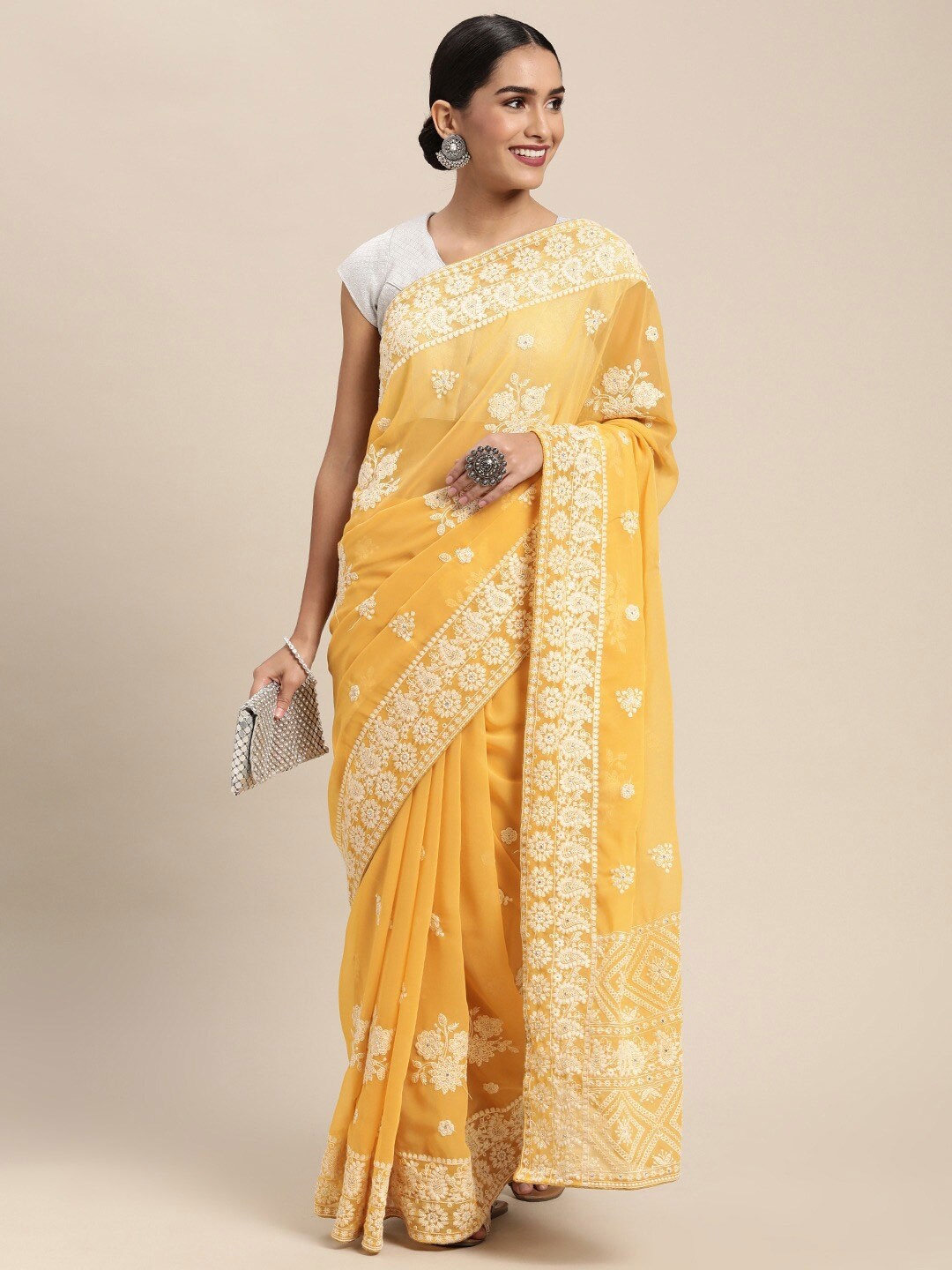 

Mitera Mustard Yellow Floral Chikankari Embroidered Pure Georgette Saree