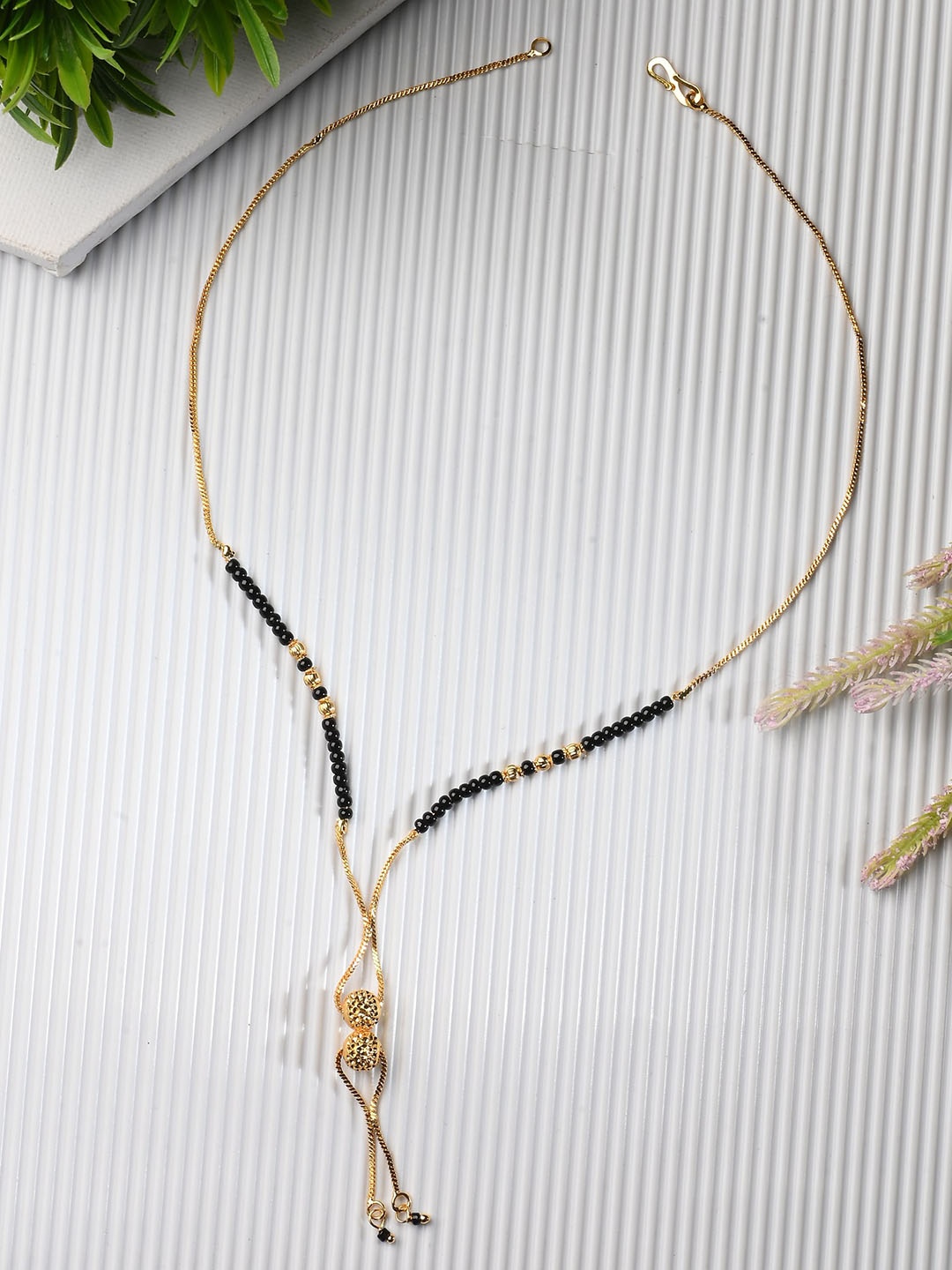 

AanyaCentric Gold-Plated Beaded Mangalsutra & Ring Set