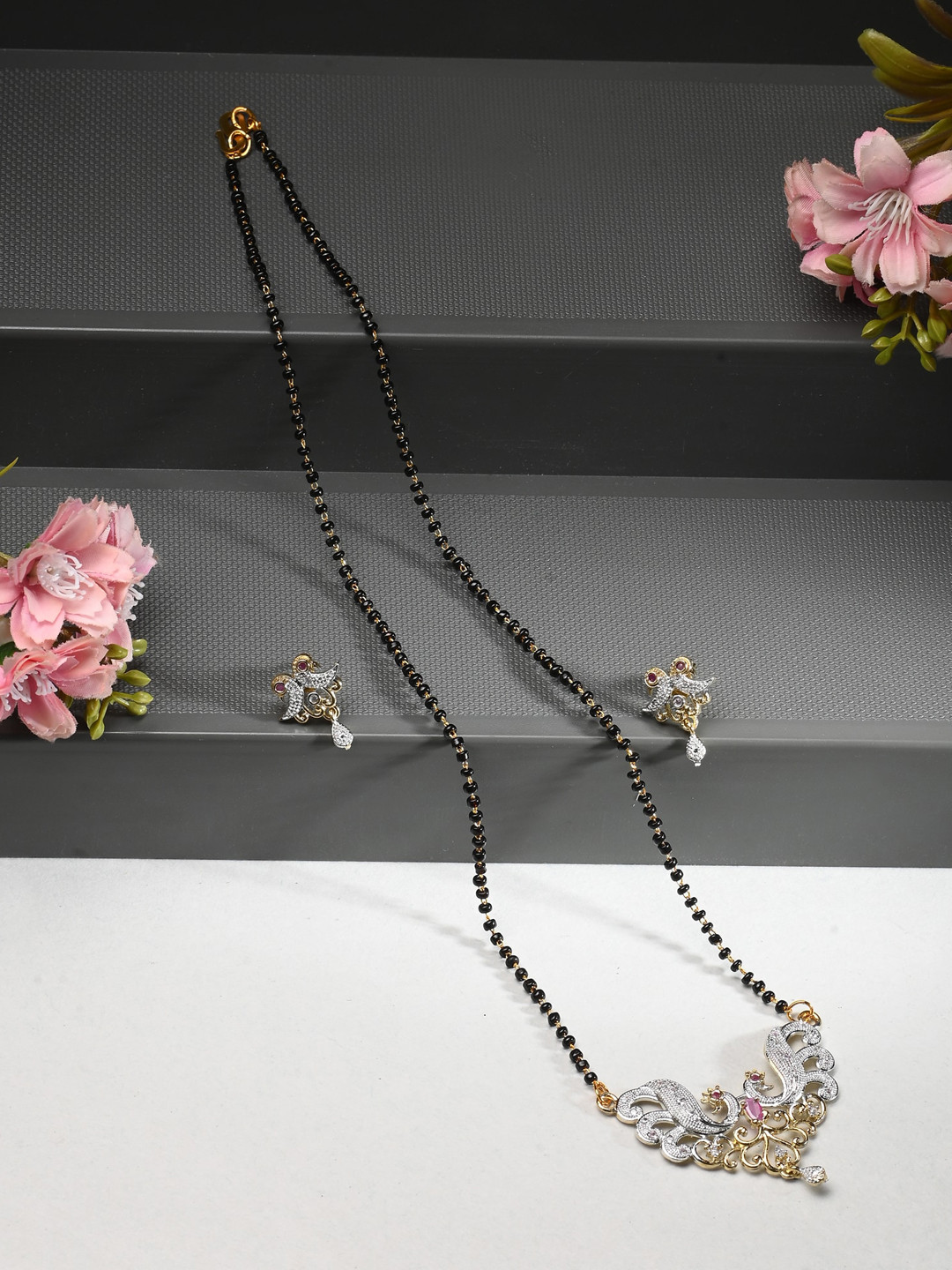 

AanyaCentric Gold-Plated Mangalsutra Pendant Earring Set & Silver Plated Anklet