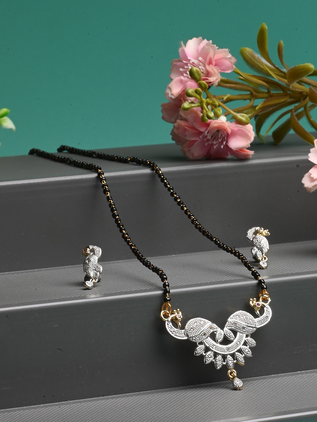 

AanyaCentric Gold-Plated Mangalsutra Pendant Earring Set & Silver Plated Anklet