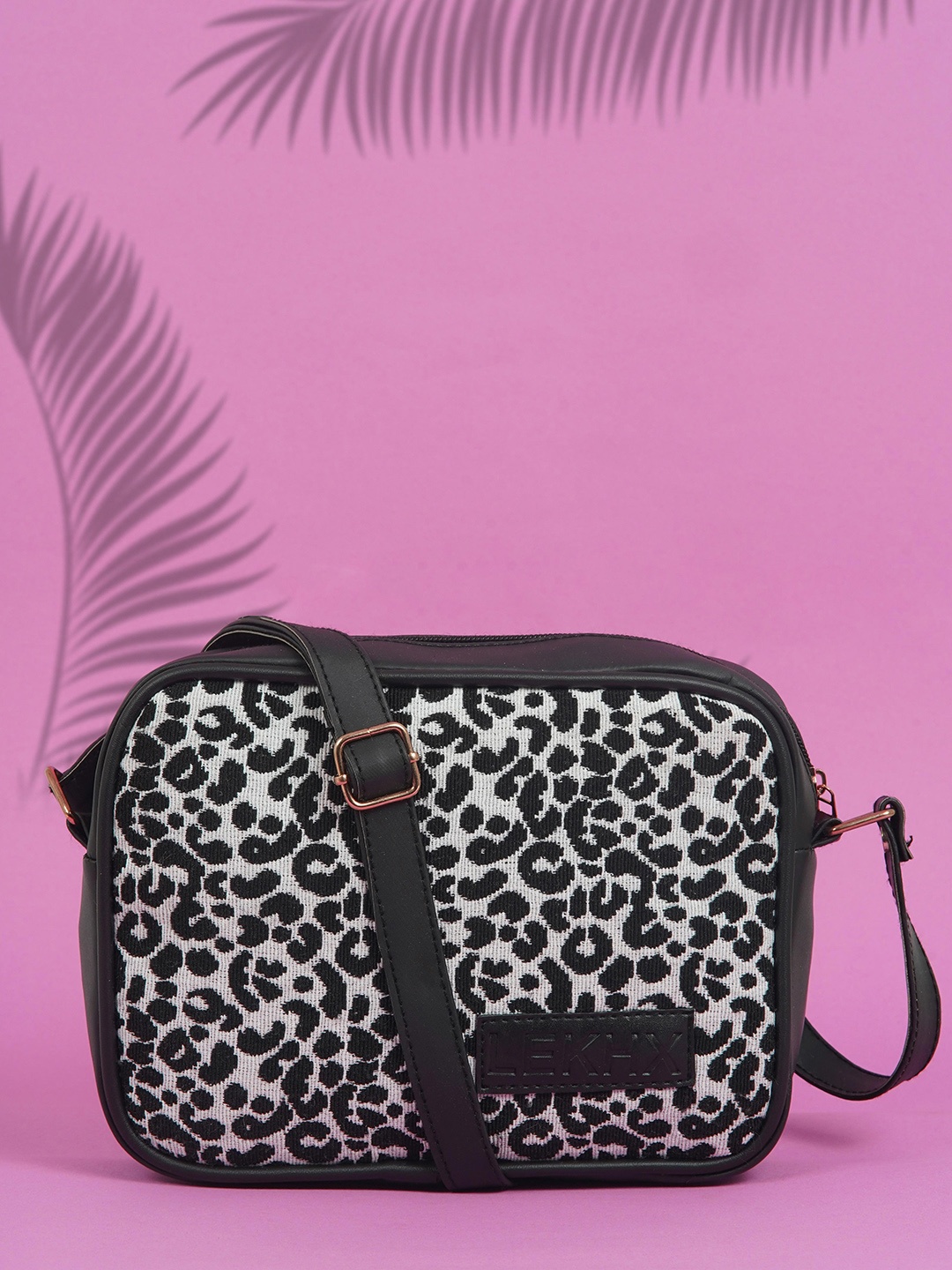 

LEKHX Animal Printed Structured Sling Bag, Black