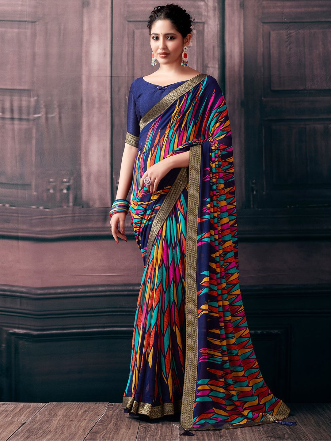 

KALINI Navy Blue Zari Ikat Saree with Tassels