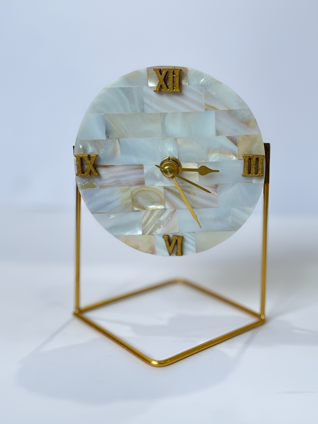 

HOMEARTE Off White & Gold Toned Mother of Pearl Round Table Clock