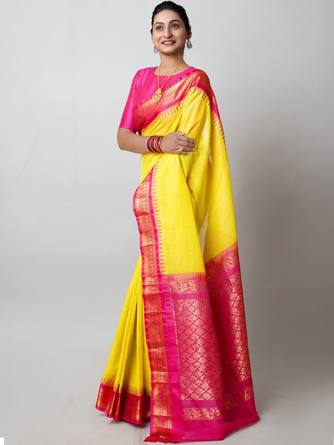 

Unnati Silks Woven Design Zari Pure Cotton Handloom Gadwal Saree, Yellow