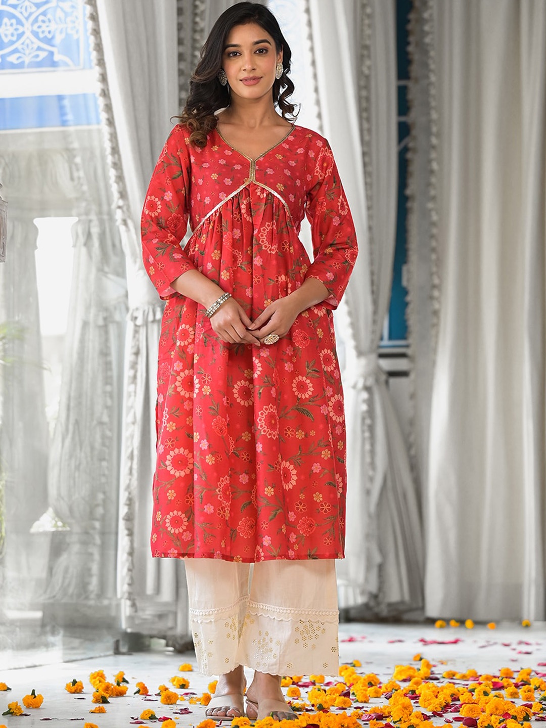 

Varanga Women Ethnic Motifs Printed Keyhole Neck Flared Sleeves Mirror Work Floral Kurta, Red