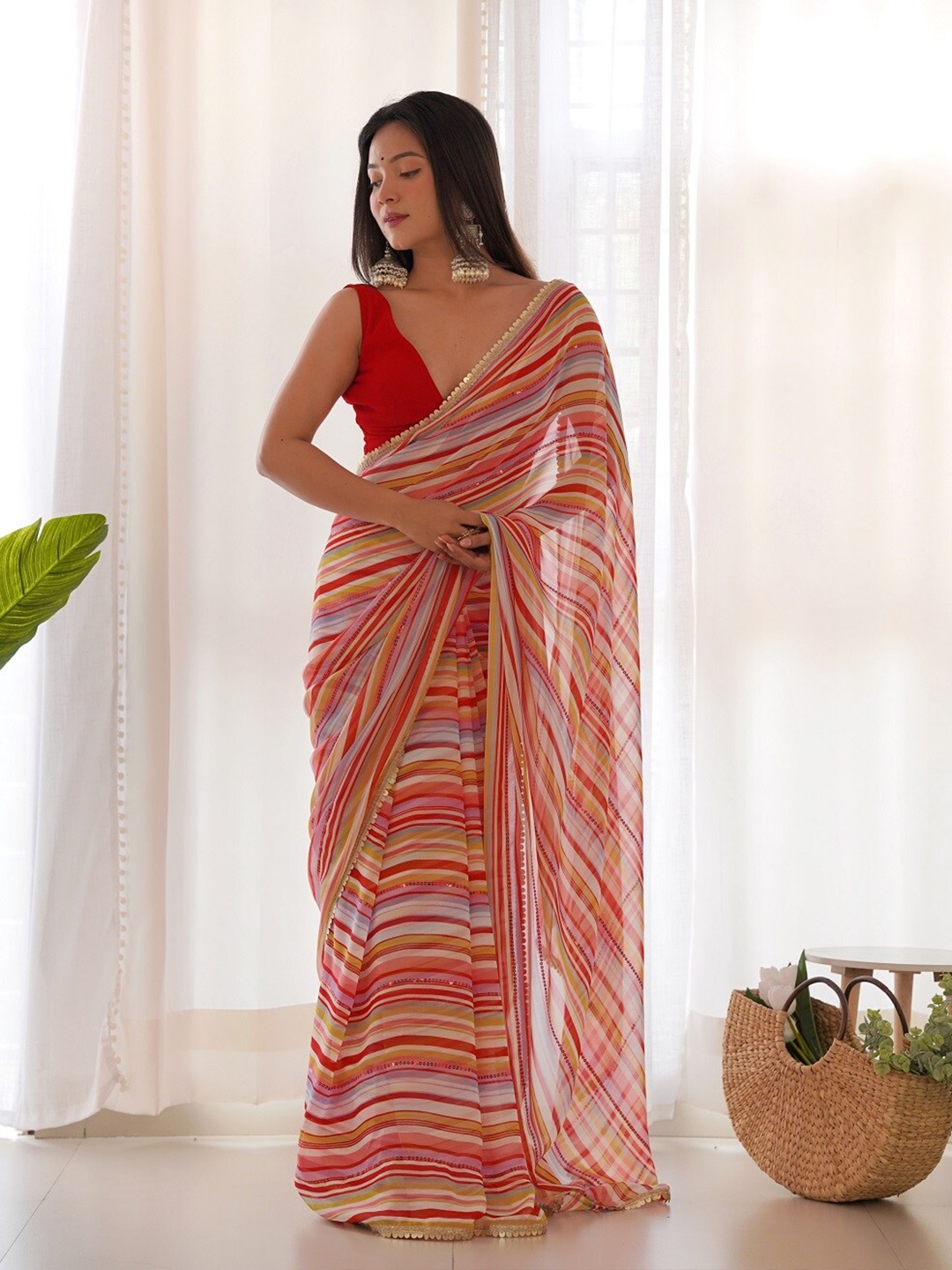 

Mitera Red & Pink Striped Pure Georgette Saree