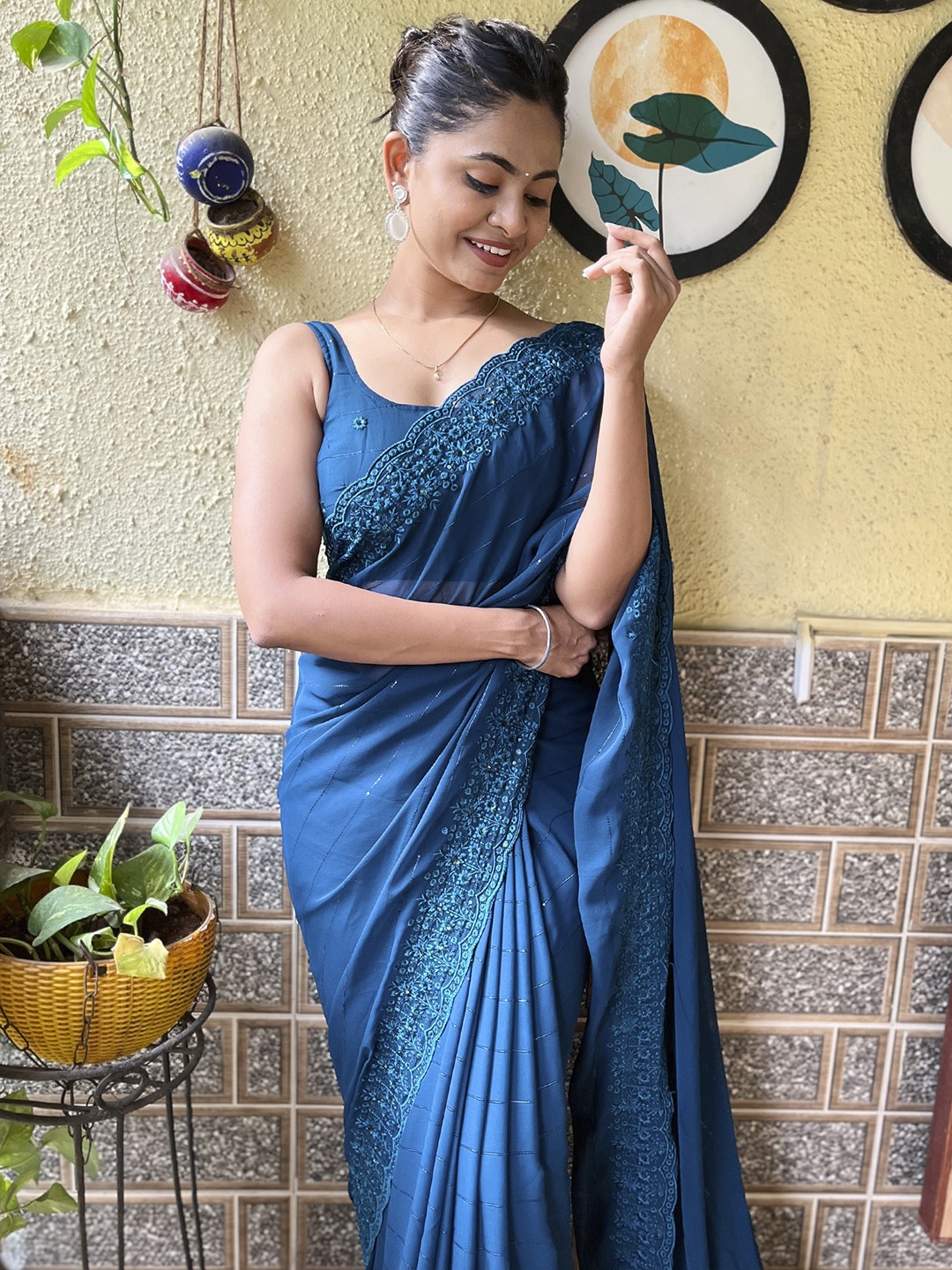 

Mitera Teal Blue Striped Embroidered Poly Georgette Saree
