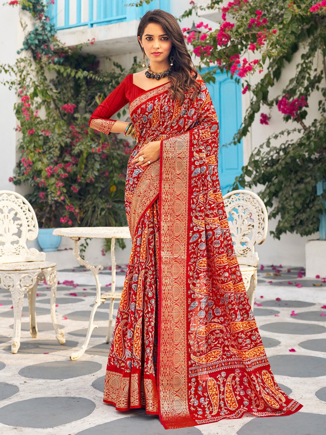 

Mitera Red & Blue Ethnic Motifs Zari Sungudi Saree