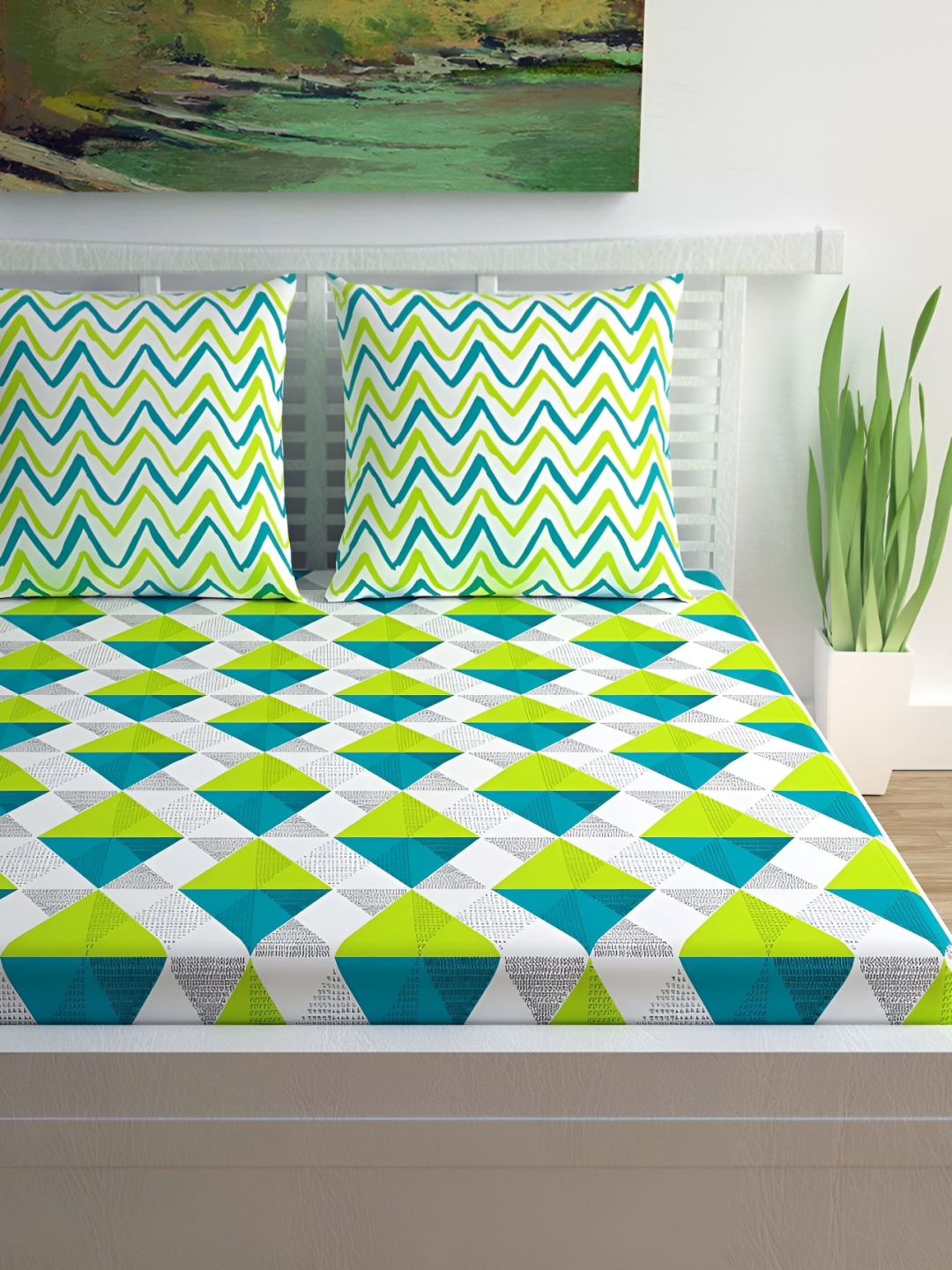 

Sohibe Blue & Green Geometric Printed Cotton 228 TC King Bedsheet With 2 Pillow Covers