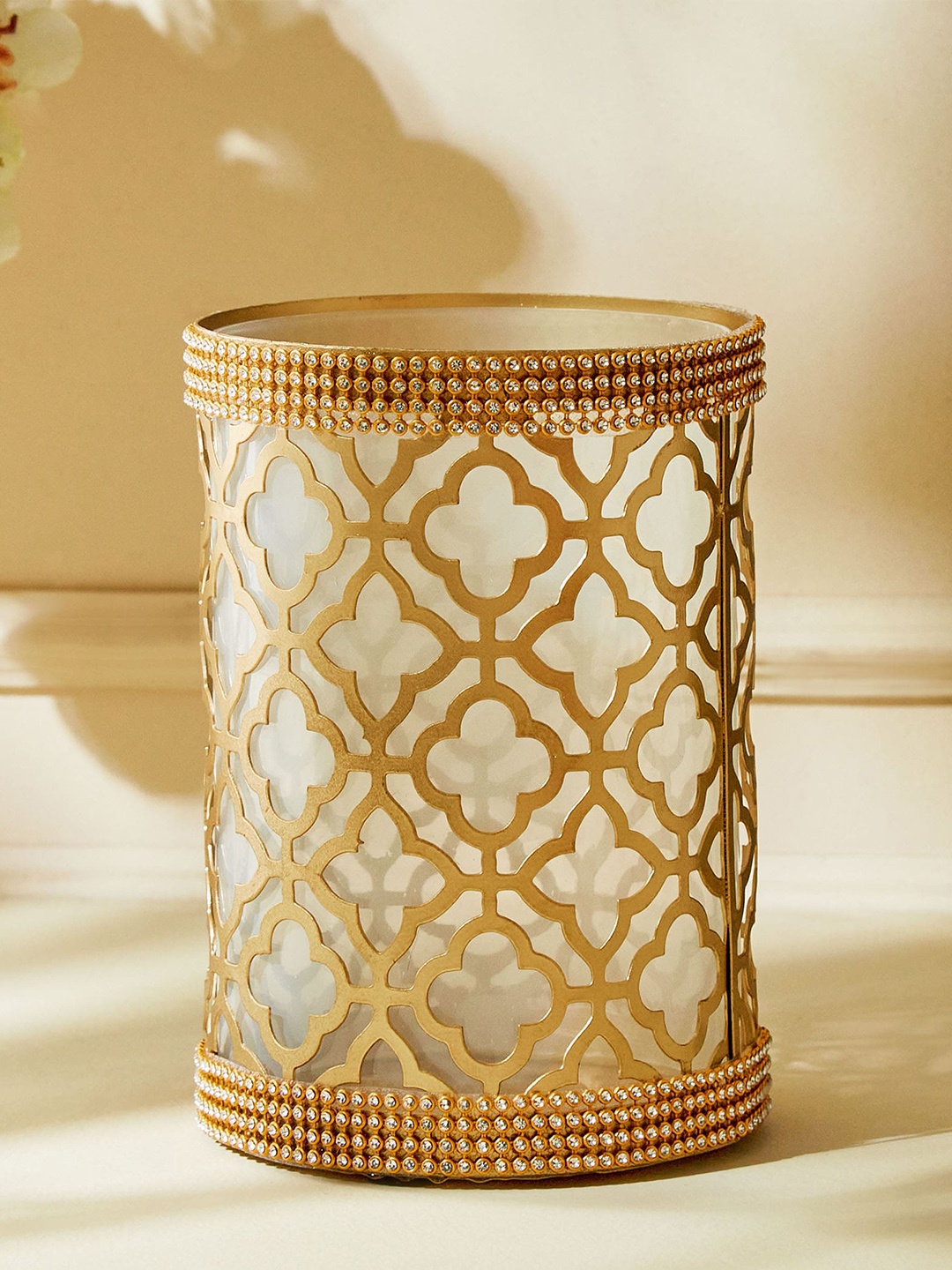

Home Centre Gold Toned Glass Hurricane Candle Holders