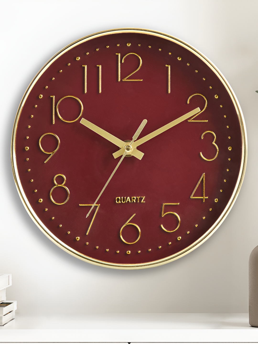 

Home Centre Red & Gold Toned Round Contemporary Wall Clock