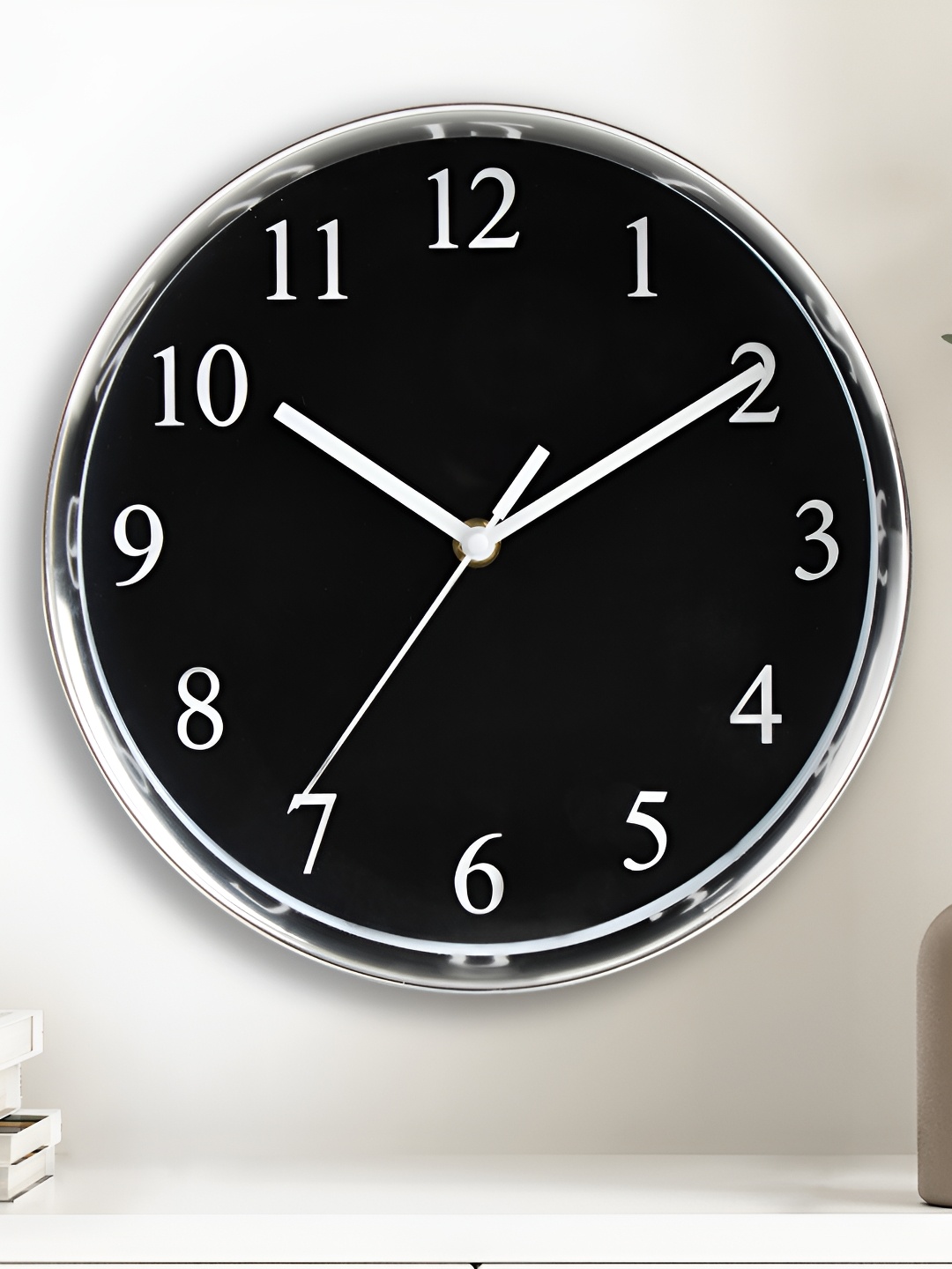 

Home Centre Black & White Round Contemporary Wall Clock