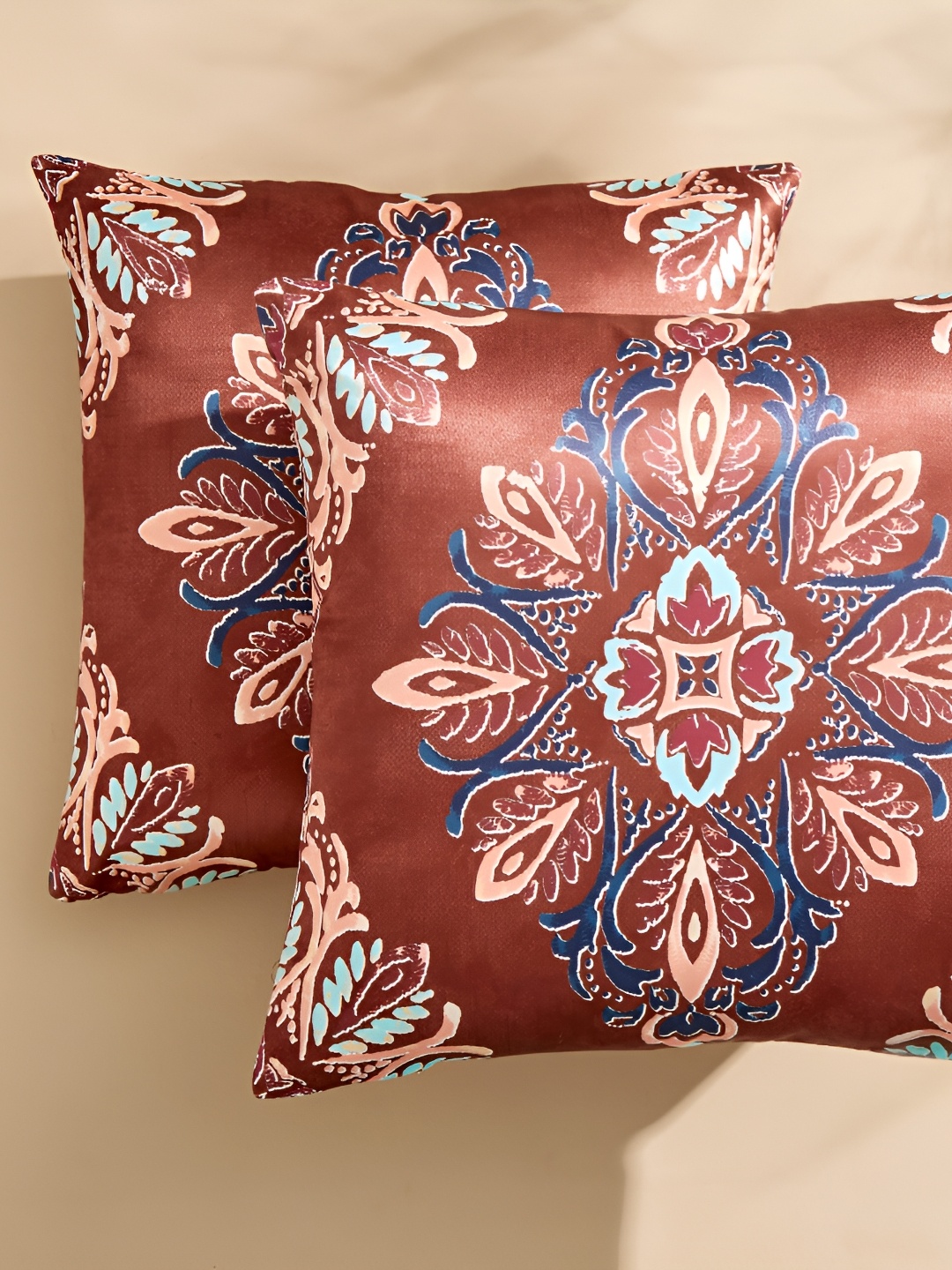 

Home Centre Brown & Blue 2 Pieces Ethnic Motifs Square Cushion Covers