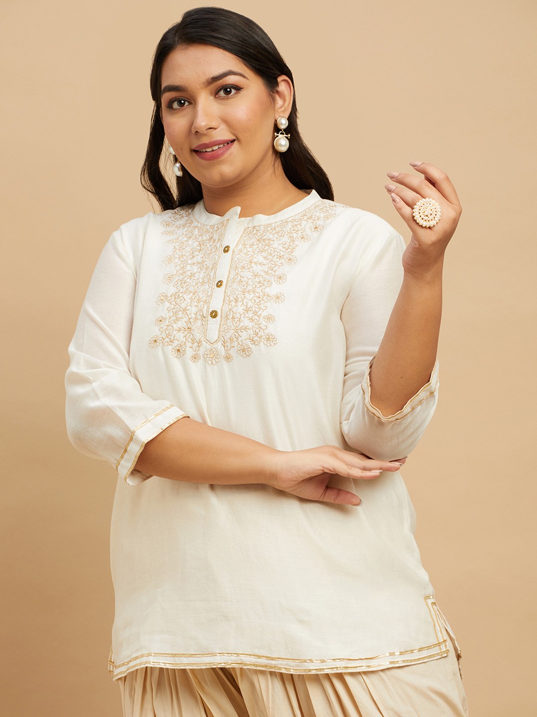 

Big Hello - The Plus Life Tribal Thread Work Thread Work Kurti, Cream
