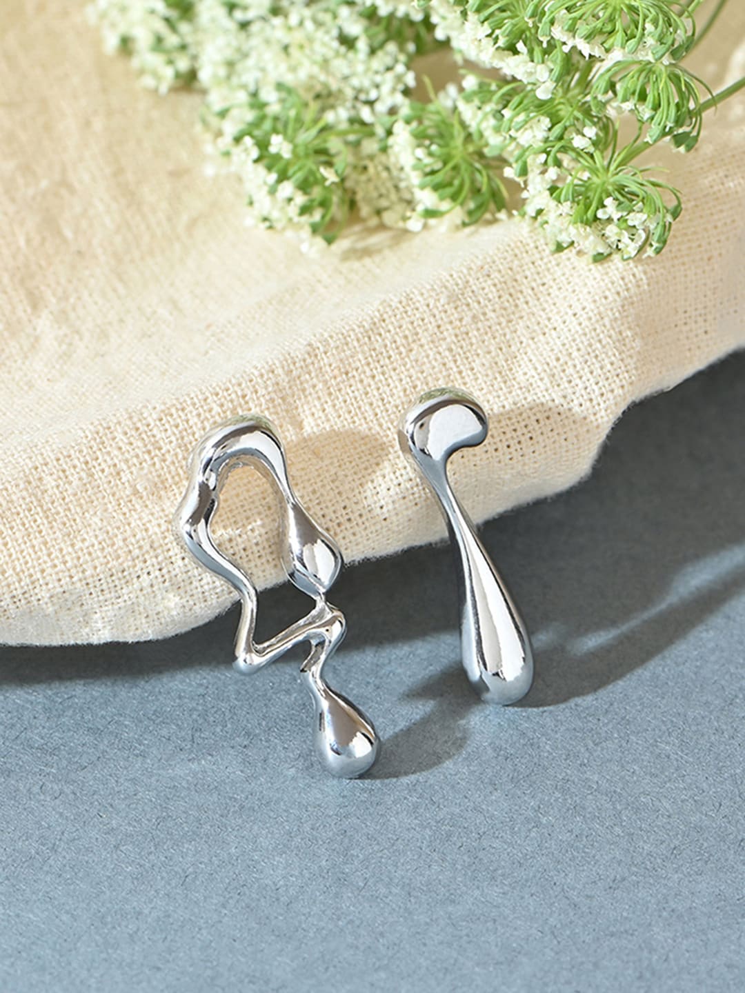 

ToniQ Silver-Plated Contemporary Mismatch Drop Earrings