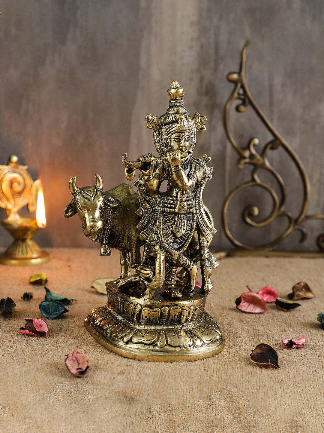 

Two Moustaches Gold Toned Textured Flute Playing Krishna With Cow Showpiece