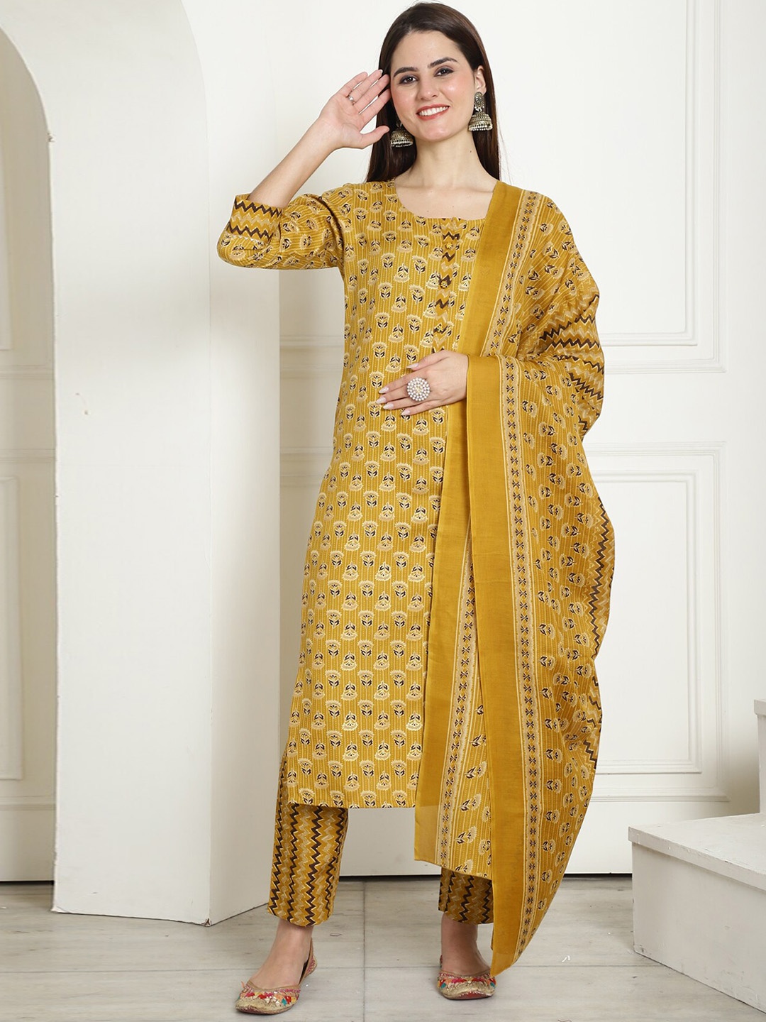 

Rajnandini Floral Printed Round Neck Kurta with Trousers & Dupatta, Mustard