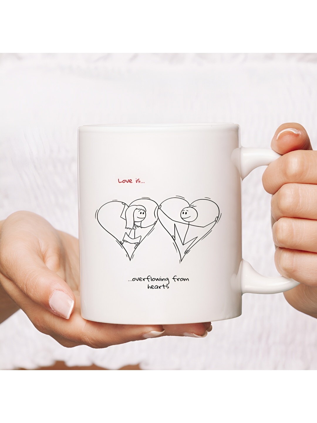 

The Decor Lane White & Black Printed Ceramic Glossy Mug 325ml