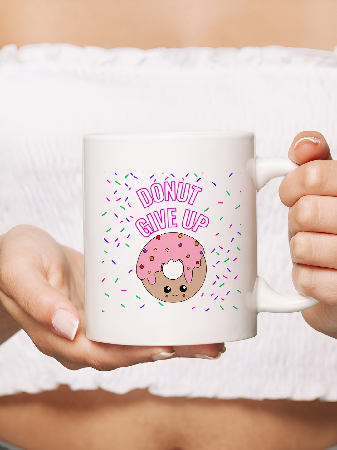 

The Decor Lane White & Pink Printed Microwave Safe Ceramic Glossy Finish Mug 325 ml