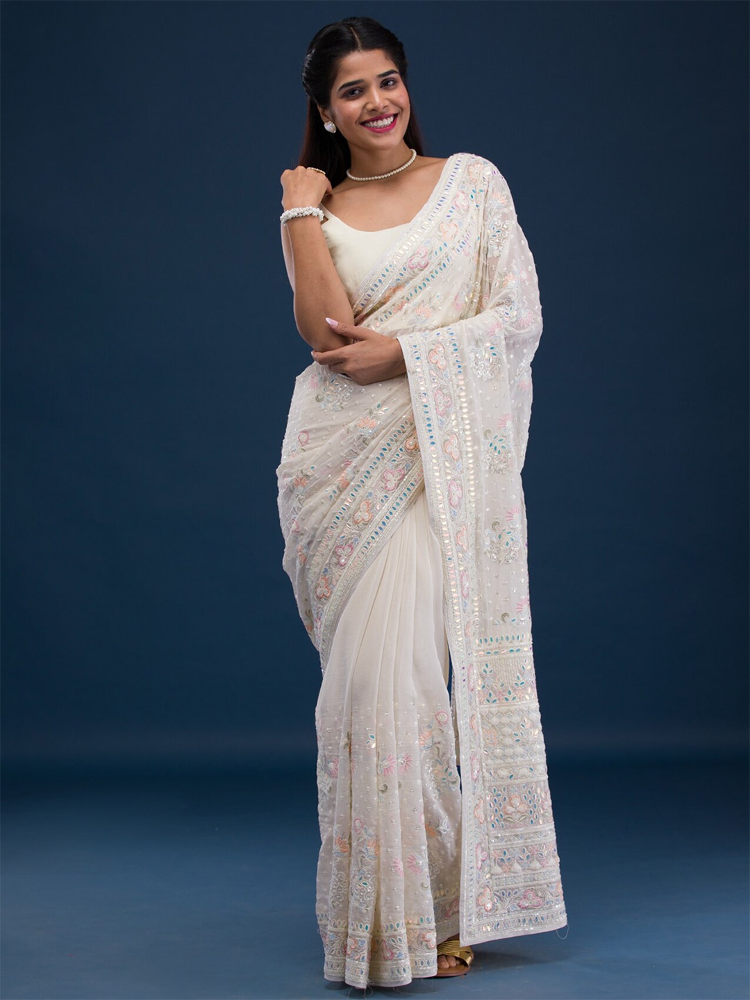 

Koskii Floral Embroidered Pure Georgette Saree, Cream