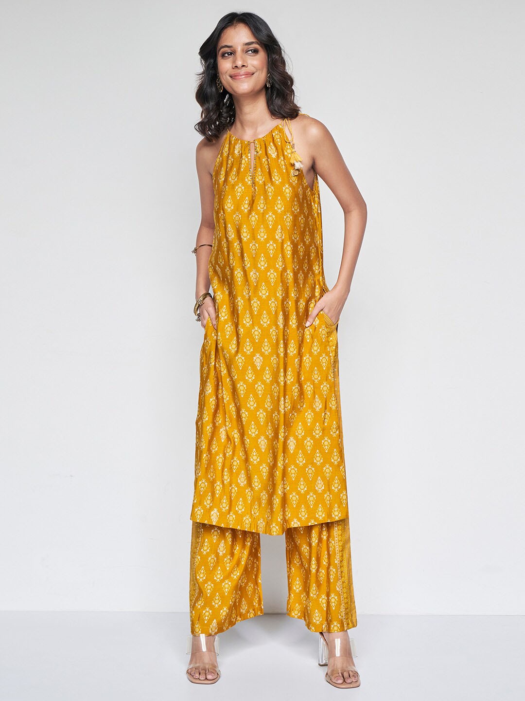 

Global Desi Floral Printed Regular Kurta with Palazzos, Mustard