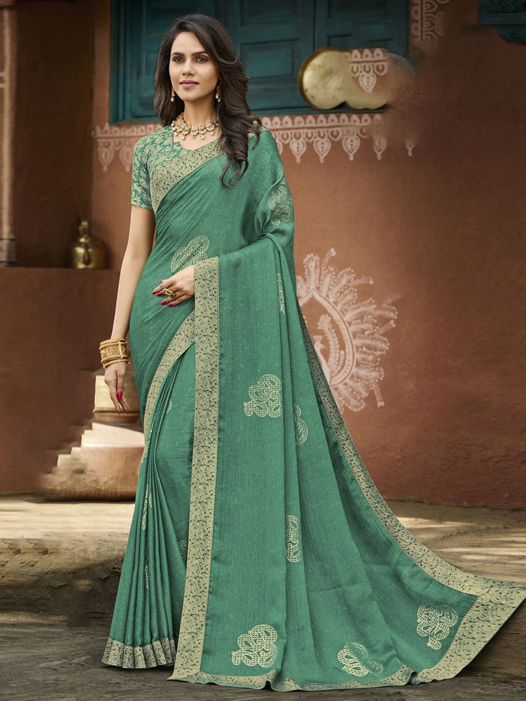 

Anouk Green Embellished Woven Design Saree