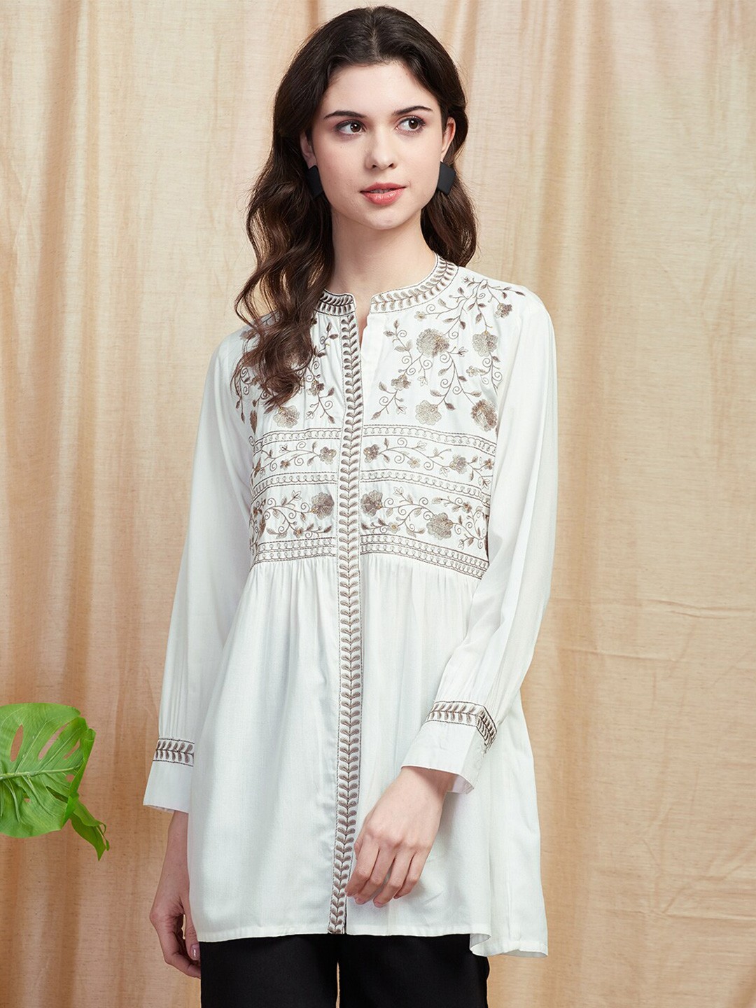 

FASHOR White Ethnic Motifs Embroidered Cuffed Sleeves Thread Work Pleated A-line Kurti