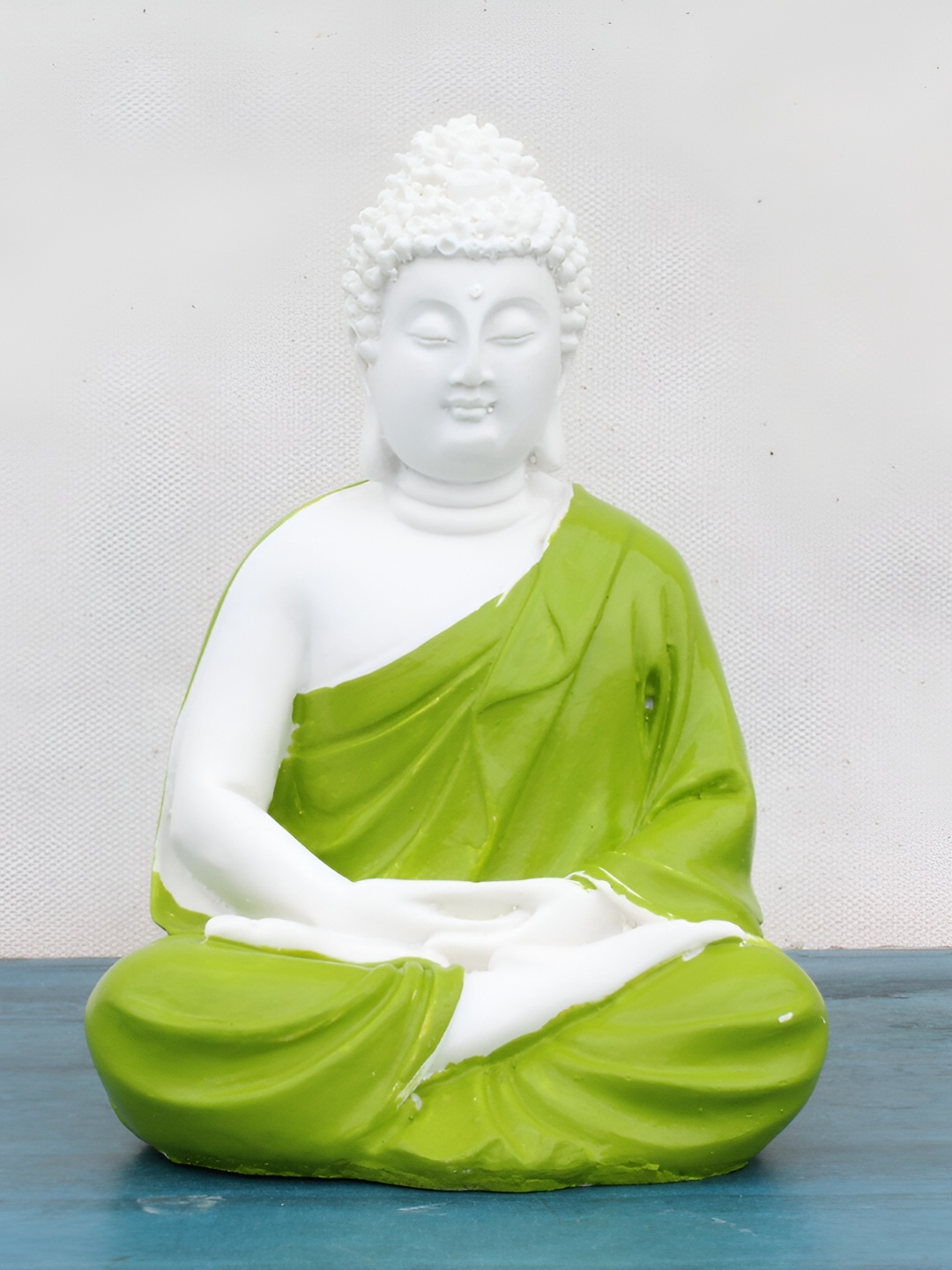 

Vikarafty Olive Green Buddha Idol Showpiece