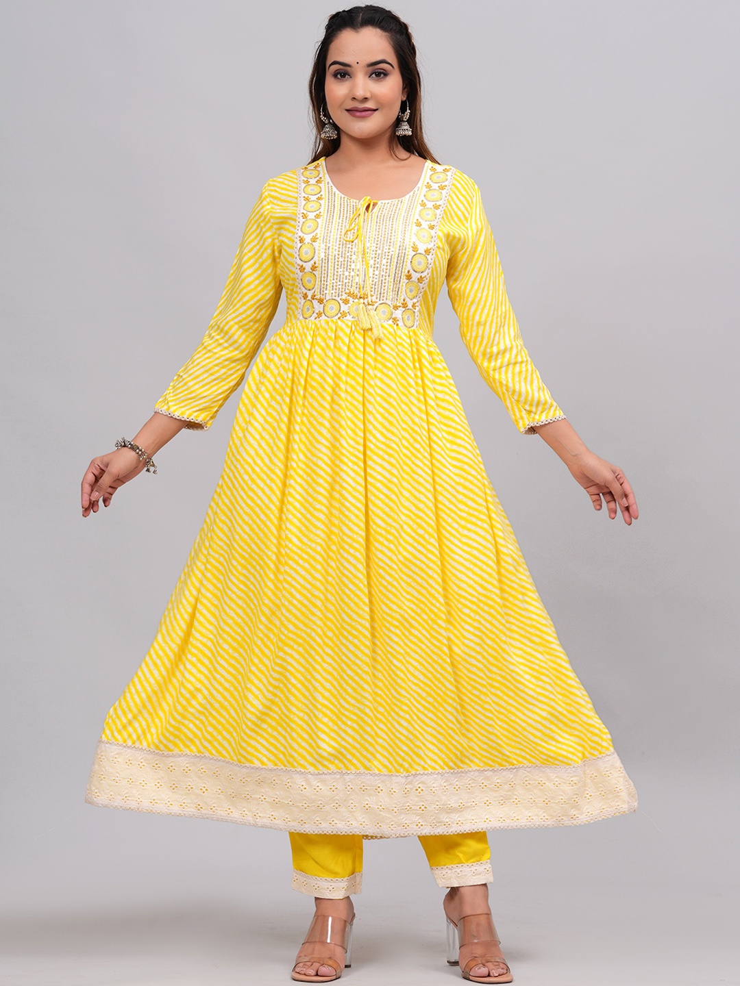 

KALINI Leheriya Printed Tie Up Neck Thread Work Kurta with Trousers & Dupatta, Yellow