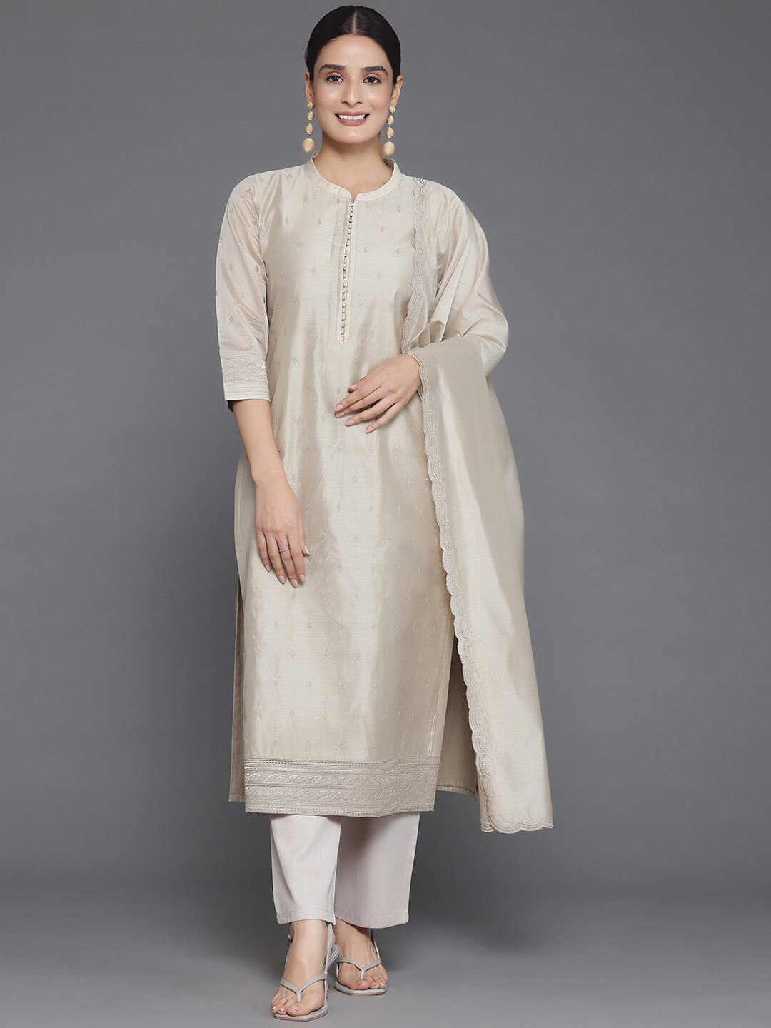 

Libas Beige Floral Embroidered Regular Chanderi Silk Kurta with Trousers & Dupatta