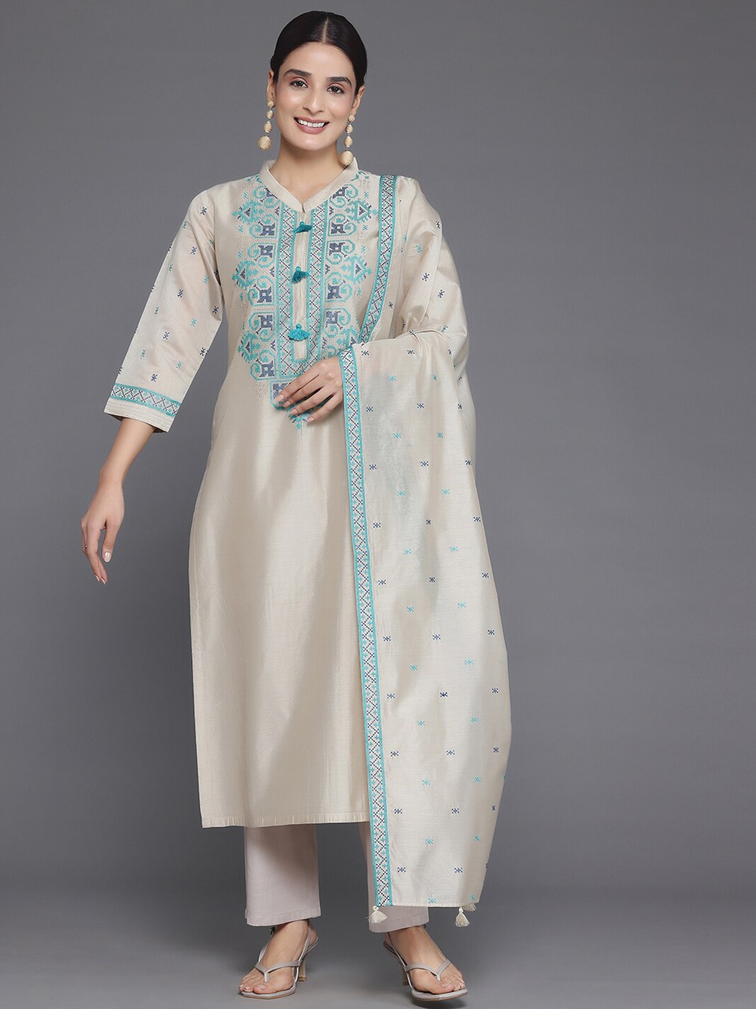 

Libas Beige Floral Yoke Design Thread Work Chanderi Silk Kurta with Trousers & Dupatta