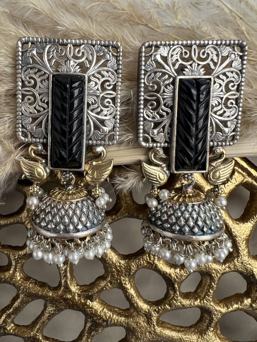 

XAGO Silver-Plated Swan Shaped Jhumkas Earrings