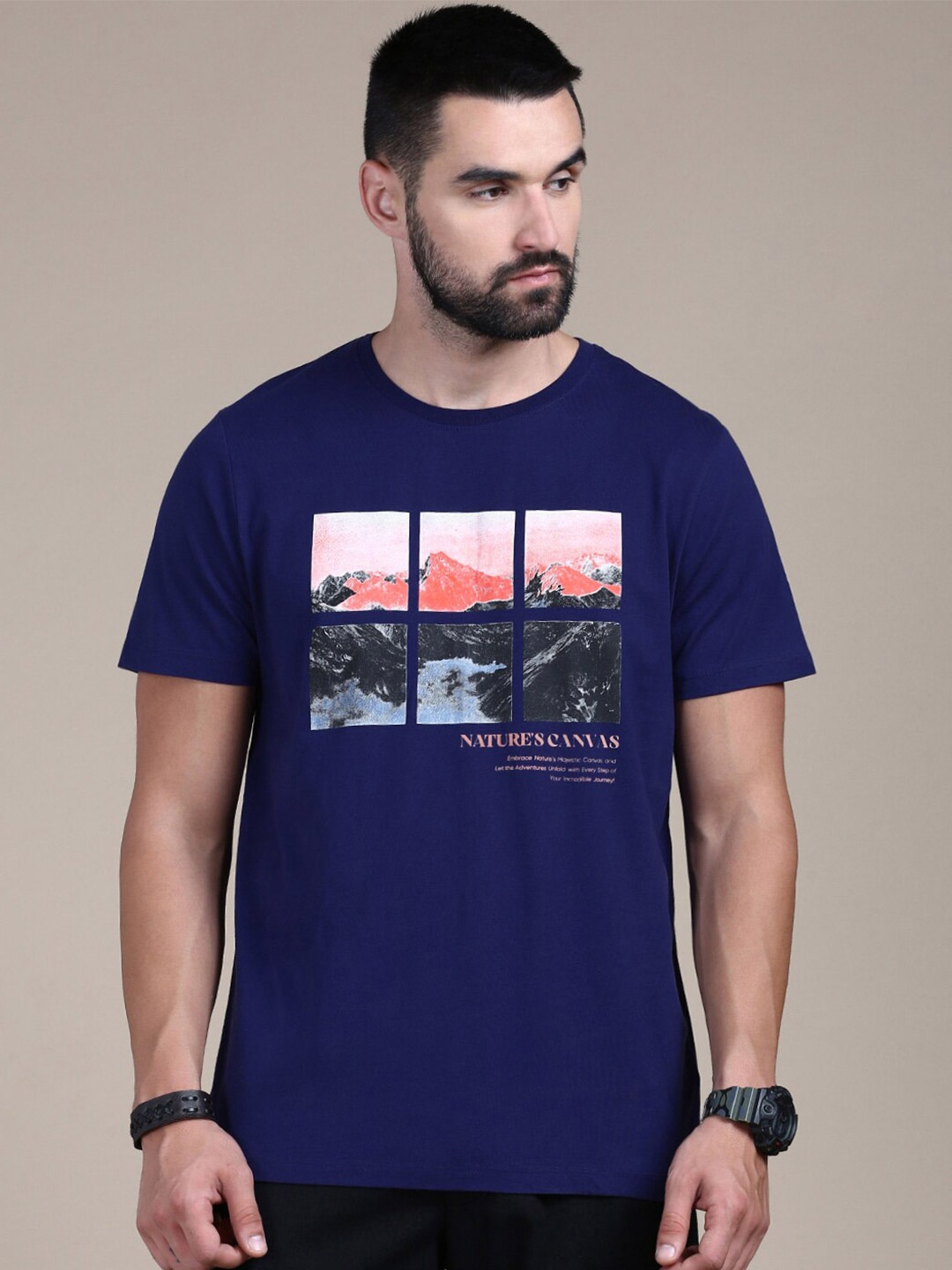 

The Roadster Lifestyle Co Navy Blue Graphic Printed Cotton Round Neck Tshirts