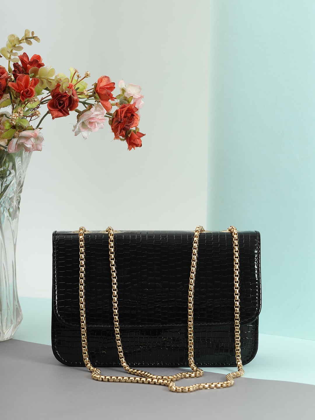 

DressBerry Black Animal Textured Structured Sling Bag