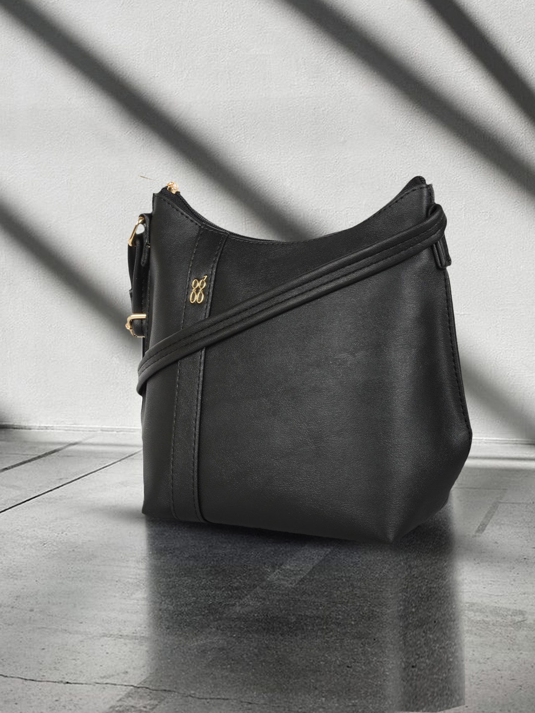 

Baggit Textured Structured Sling Bag, Black