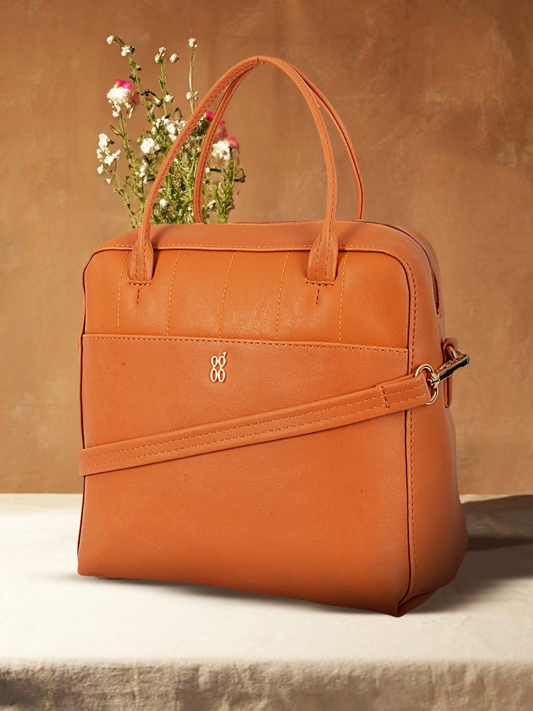

Baggit Structured Handheld Camera Bag, Orange