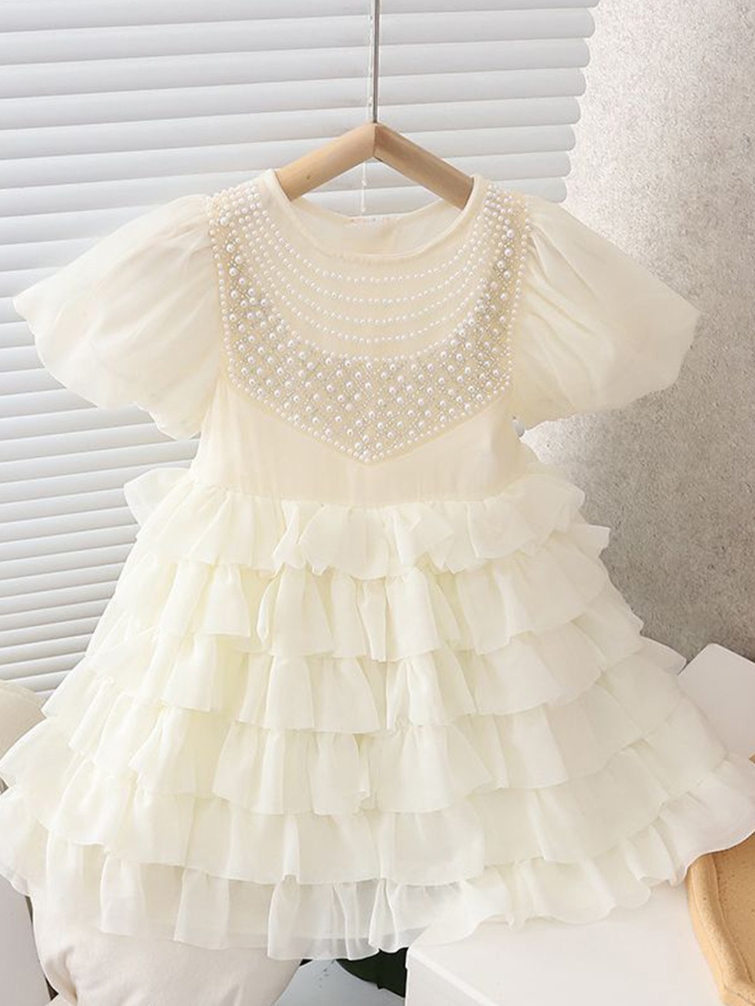 

INCLUD Girls Self Design Flutter Sleeves Net A-Line Dress, Off white