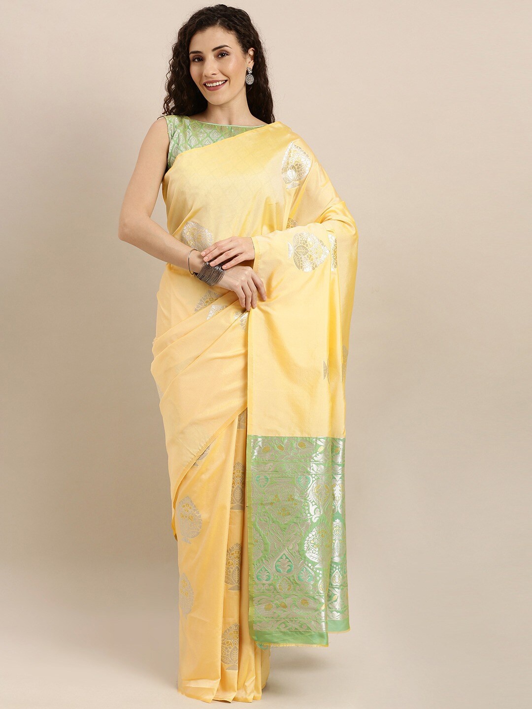 

Mitera Ethnic Motifs Woven Design Zari Saree, Yellow