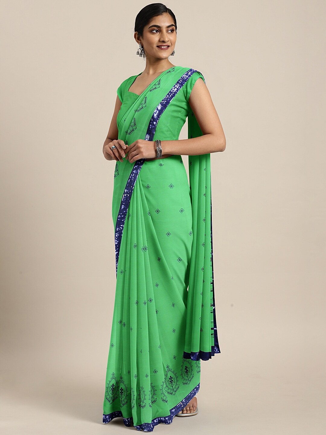 

Mitera Ethnic Motifs Embroidered Sequinned Pure Georgette Saree, Green