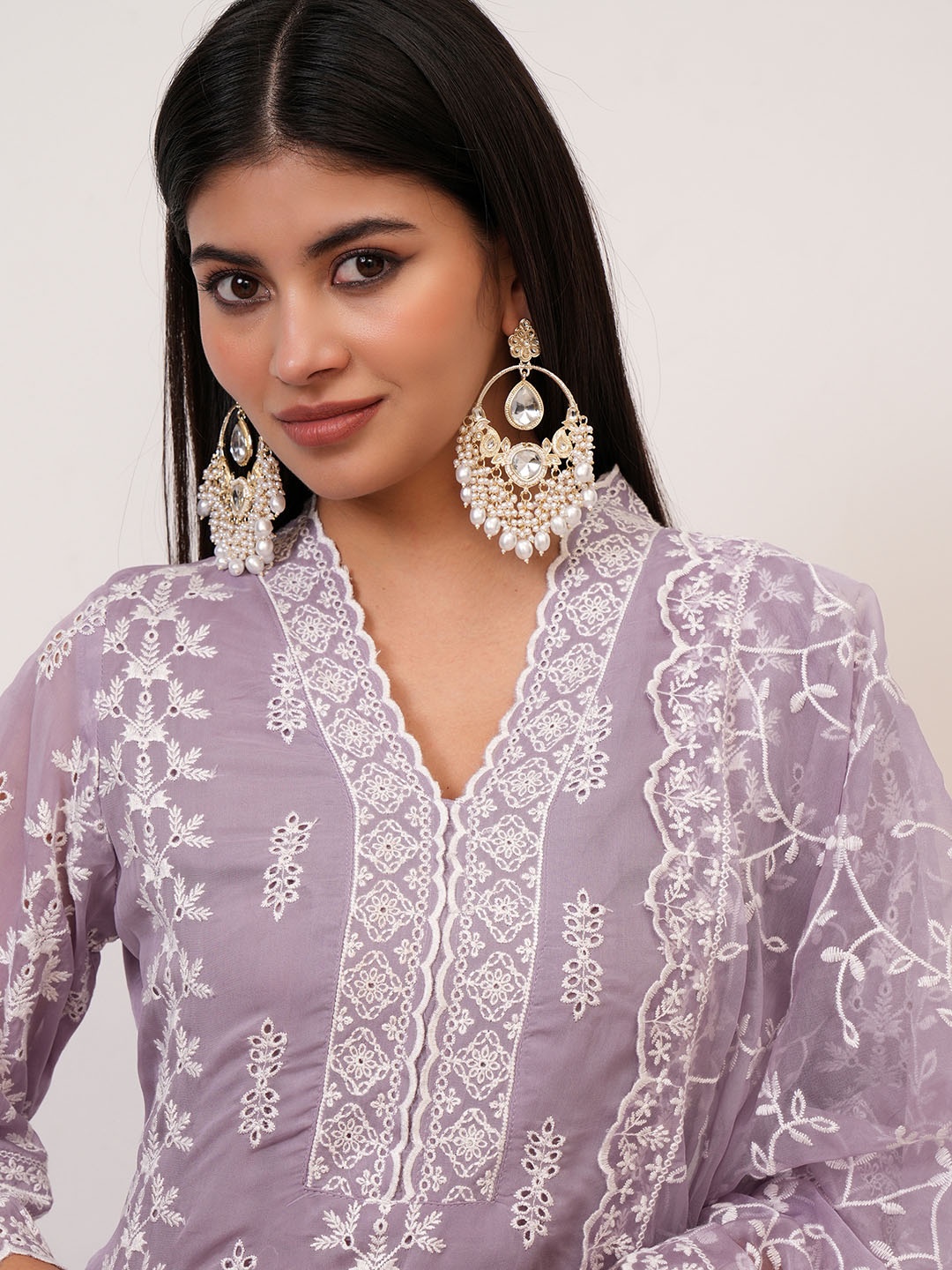 

Vishudh Purple Floral Embroidered V-Neck Straight Kurta With Trousers & Dupatta