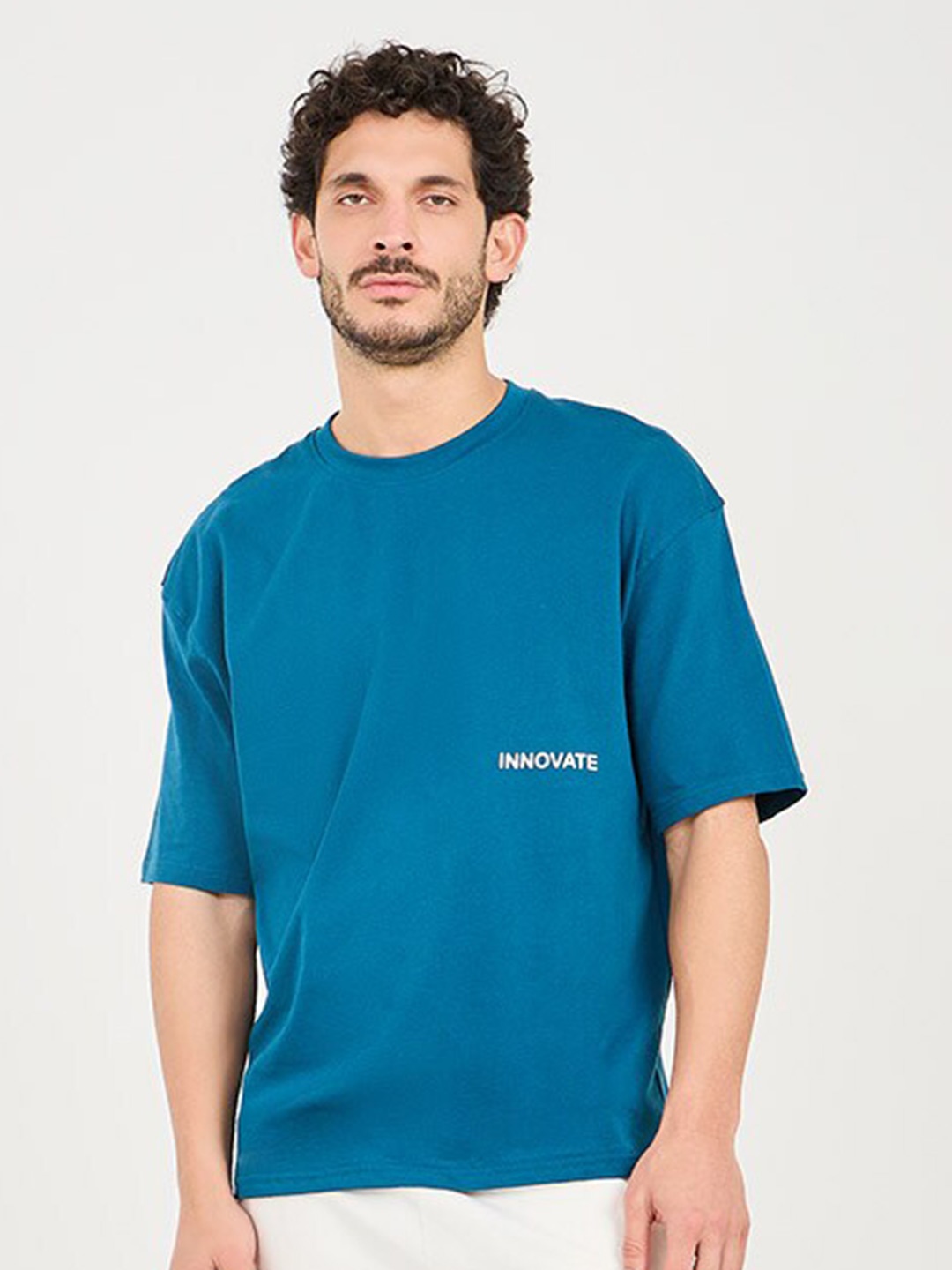 

Styli Innovate Minimal Print Drop Shoulder Oversized T-shirt, Teal