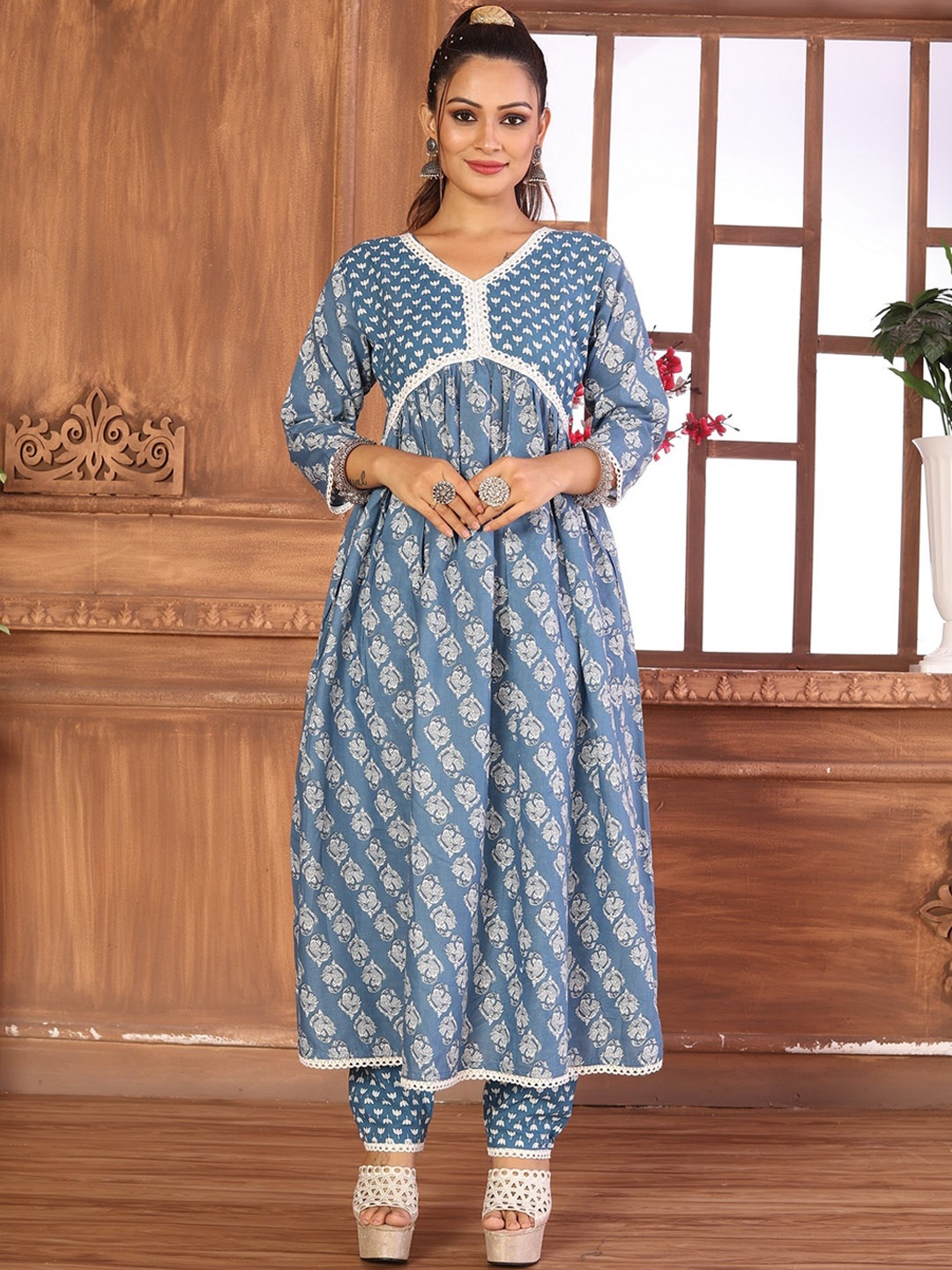 

HETVI CREATION Women Ethnic Motifs Printed Pleated Kurta with Trousers, Blue