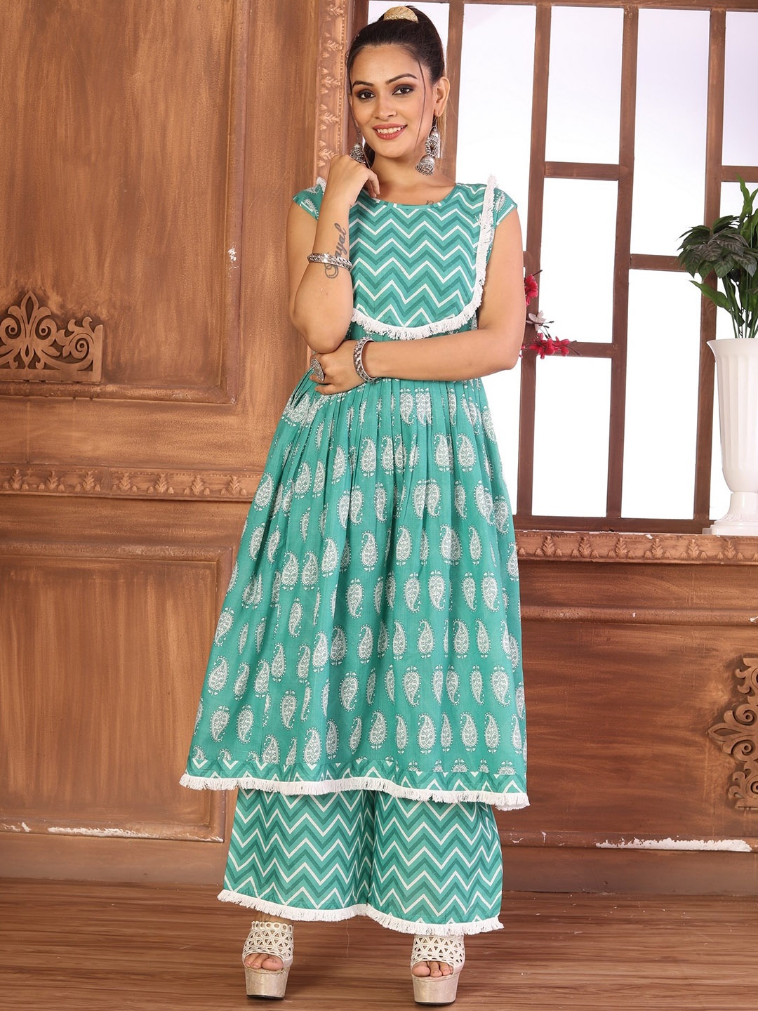 

HETVI CREATION Women Printed Regular Kurta with Palazzos, Blue