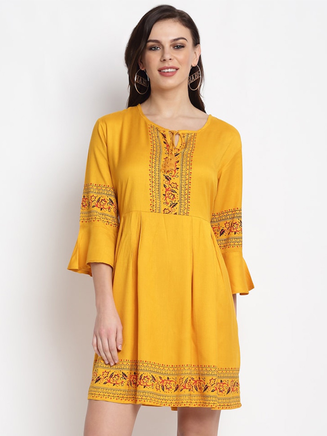 

Miaz Lifestyle Ethnic Motifs Print Tie-Up Neck Bell Sleeve Fit & Flare Dress, Mustard